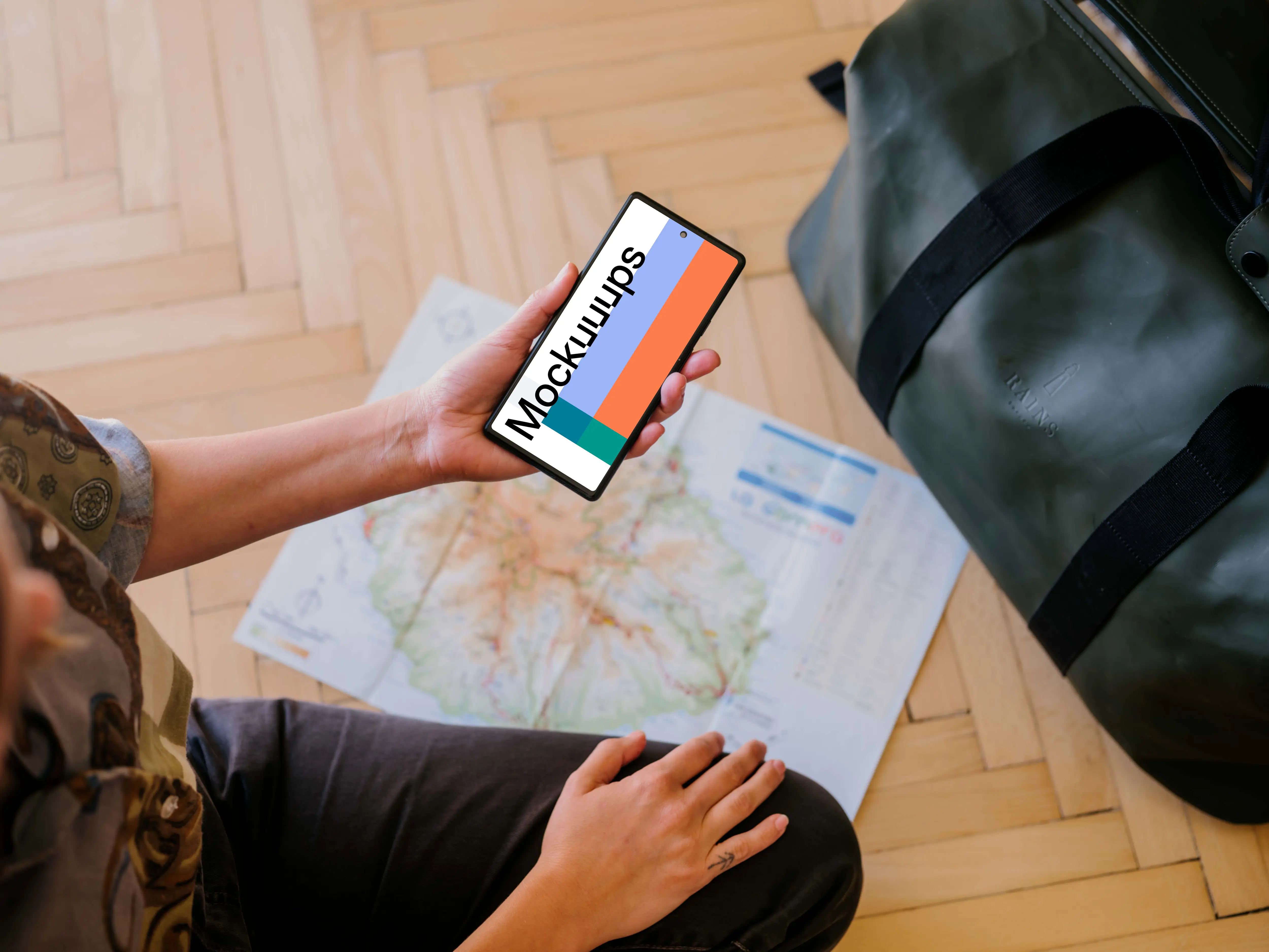 Female hand holding a phone mockup