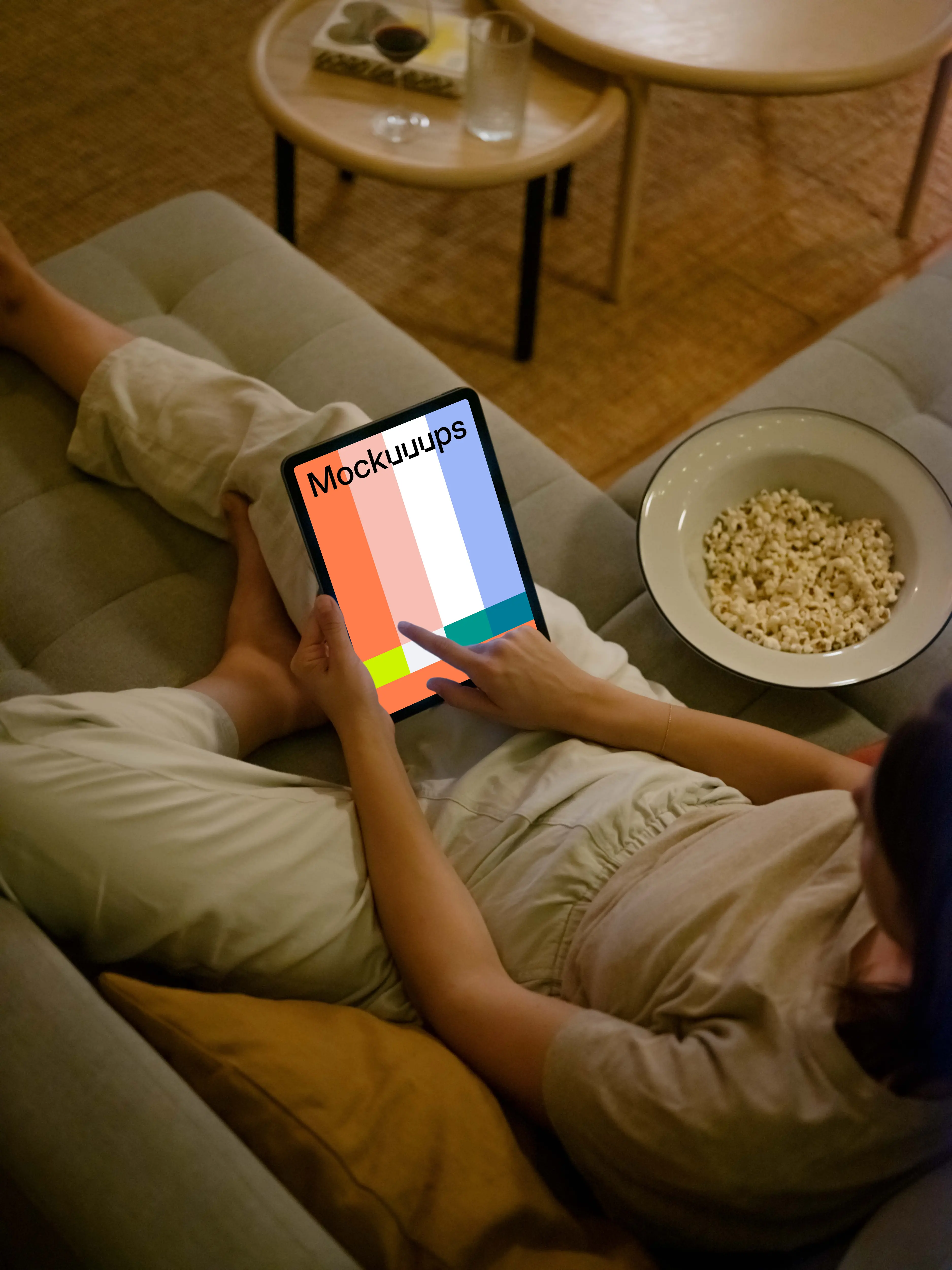 Female hand typing on an iPad Air mockup