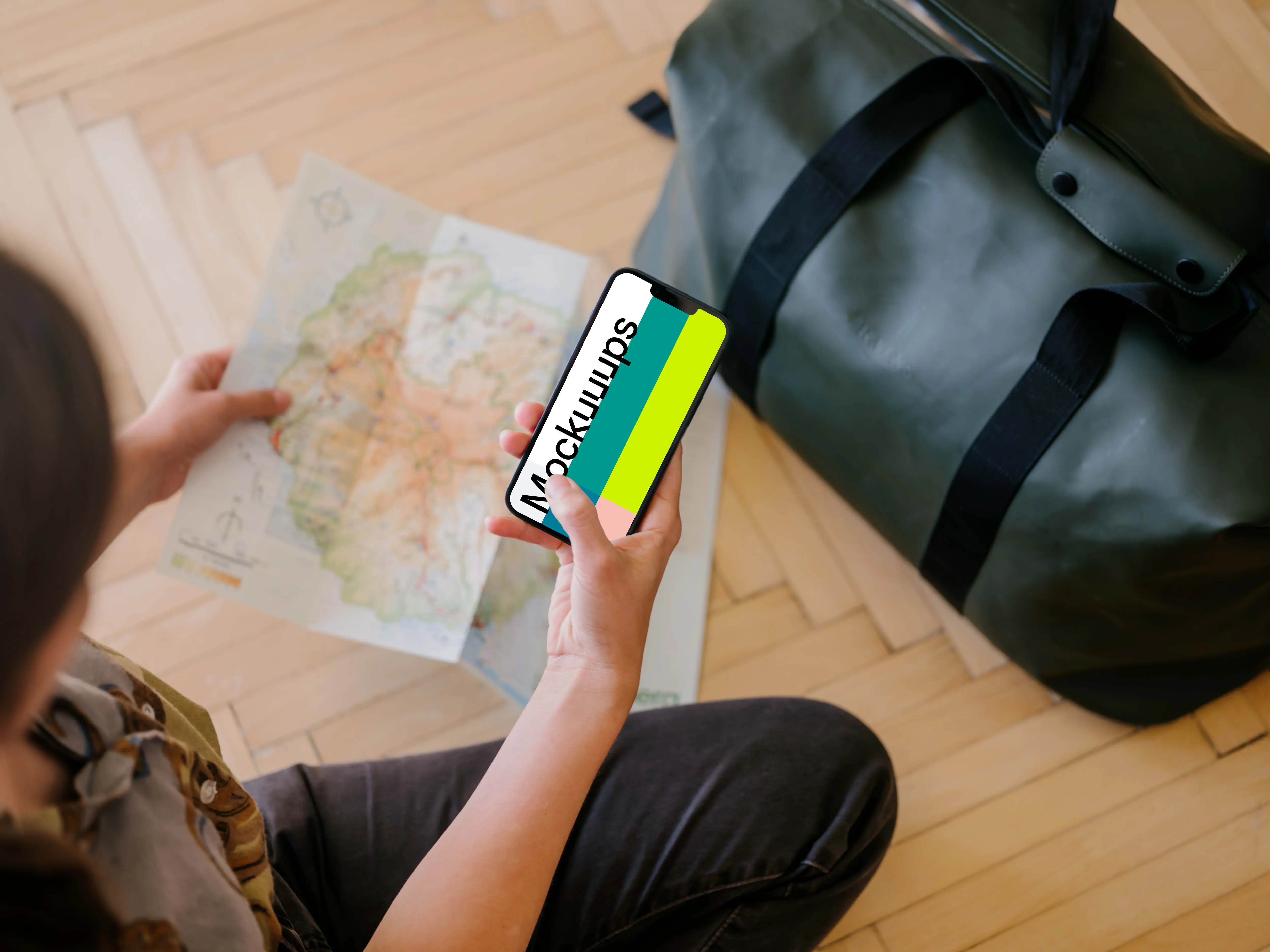 Female hand typing on an iPhone 13 mockup