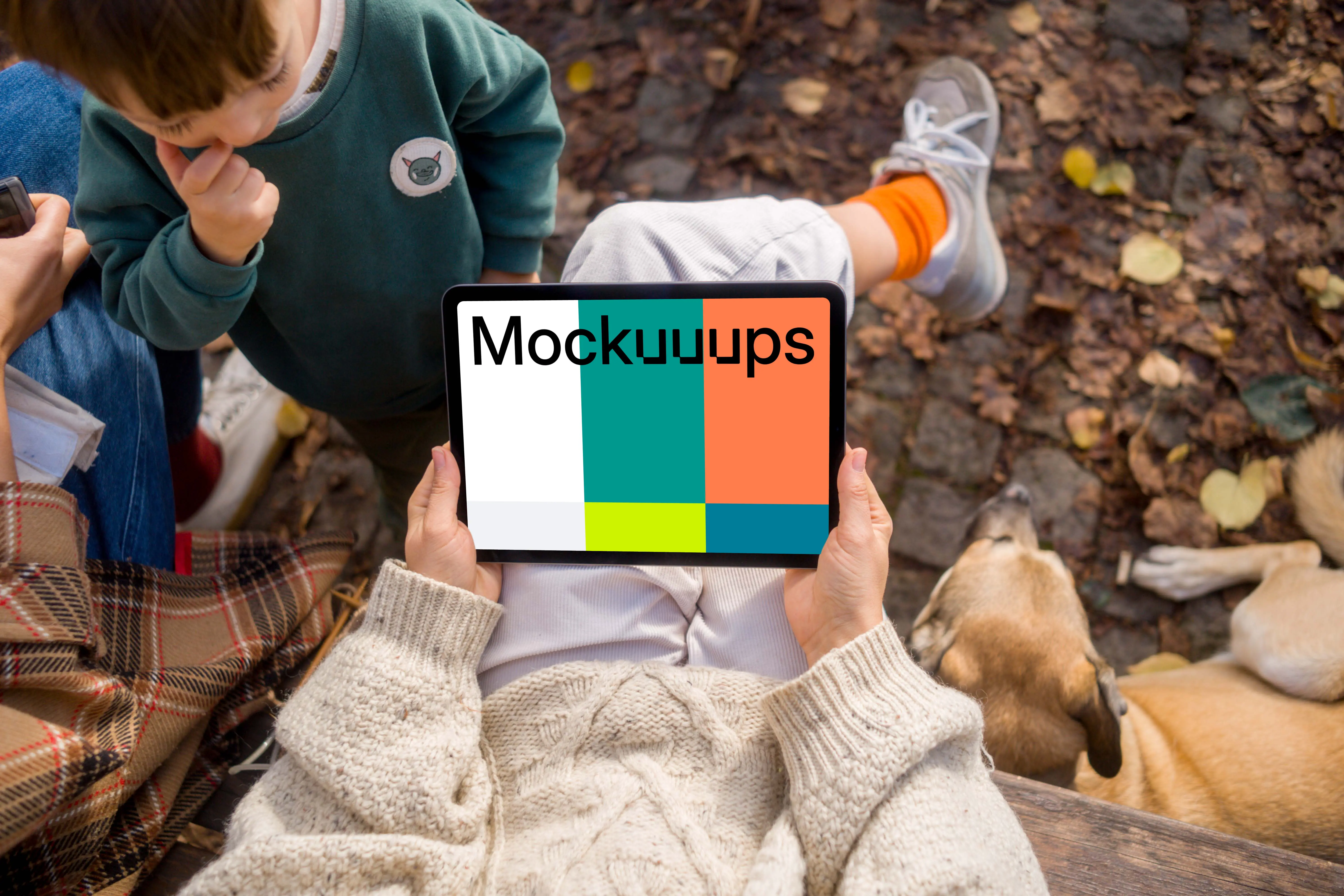 Female hands holding an iPad Air in autumn season mockup