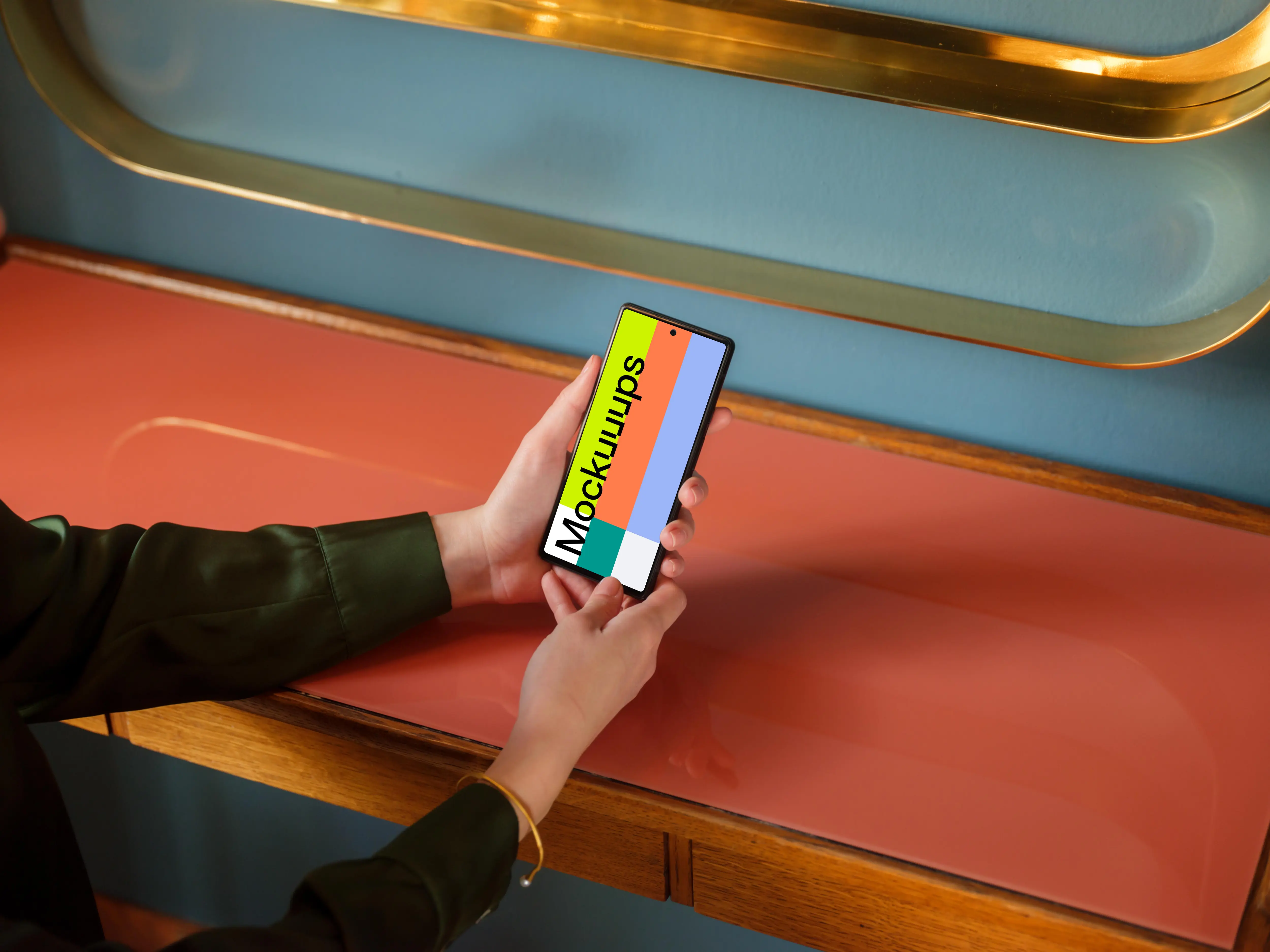 Female holding a Google Pixel mockup in the office