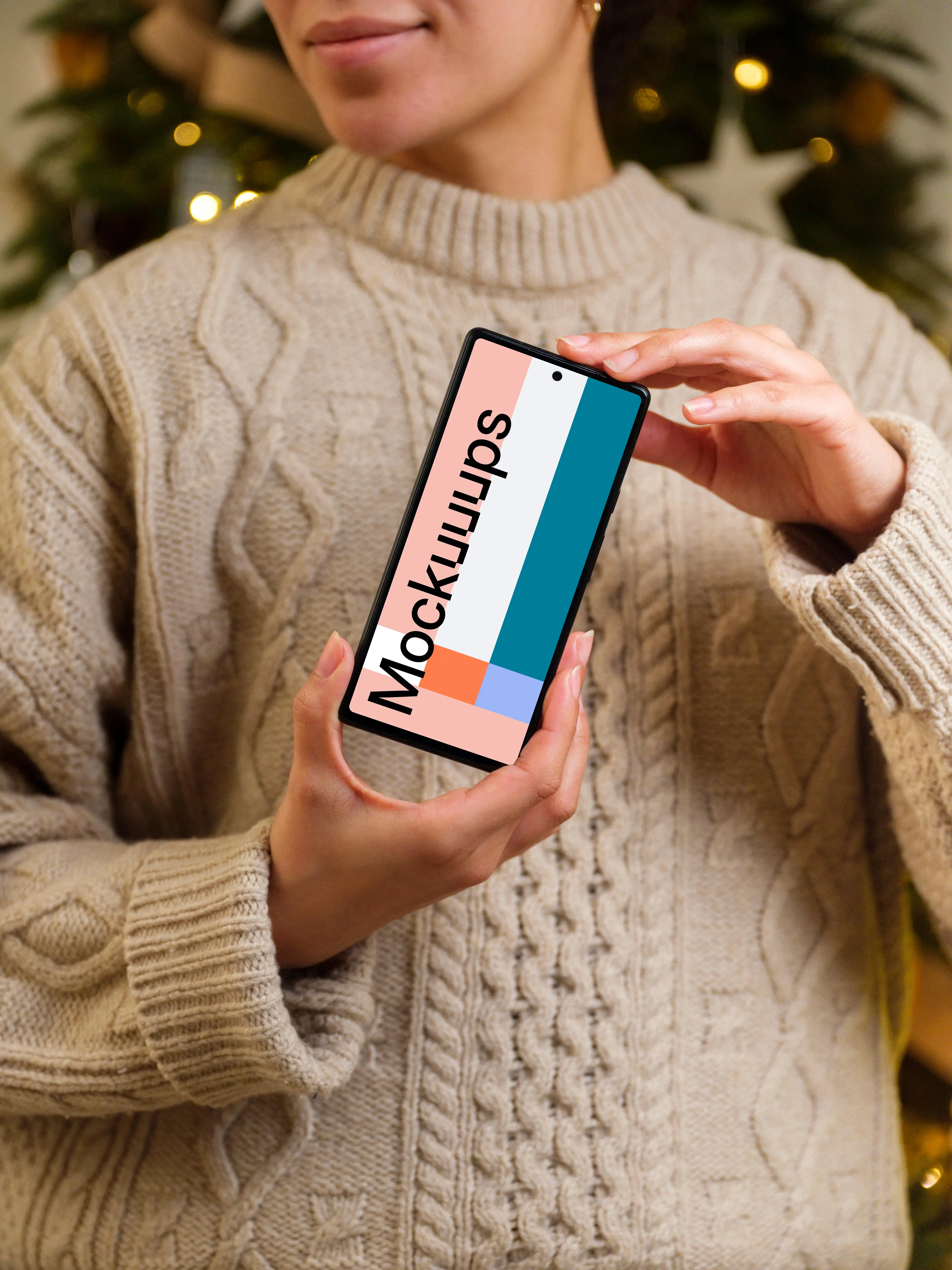 Female holding a phone mockup in Christmas theme