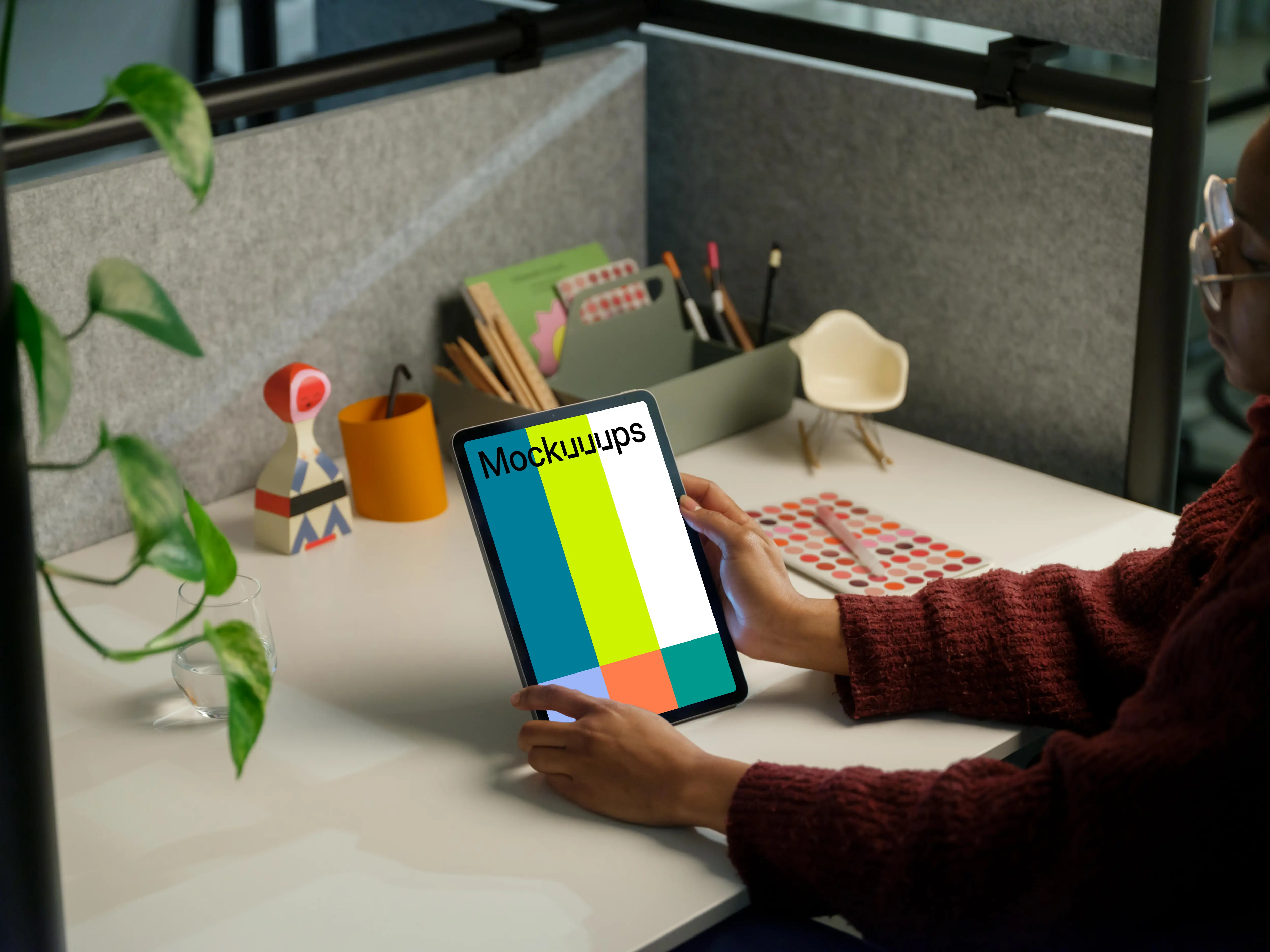 Female holding an iPad Air mockup