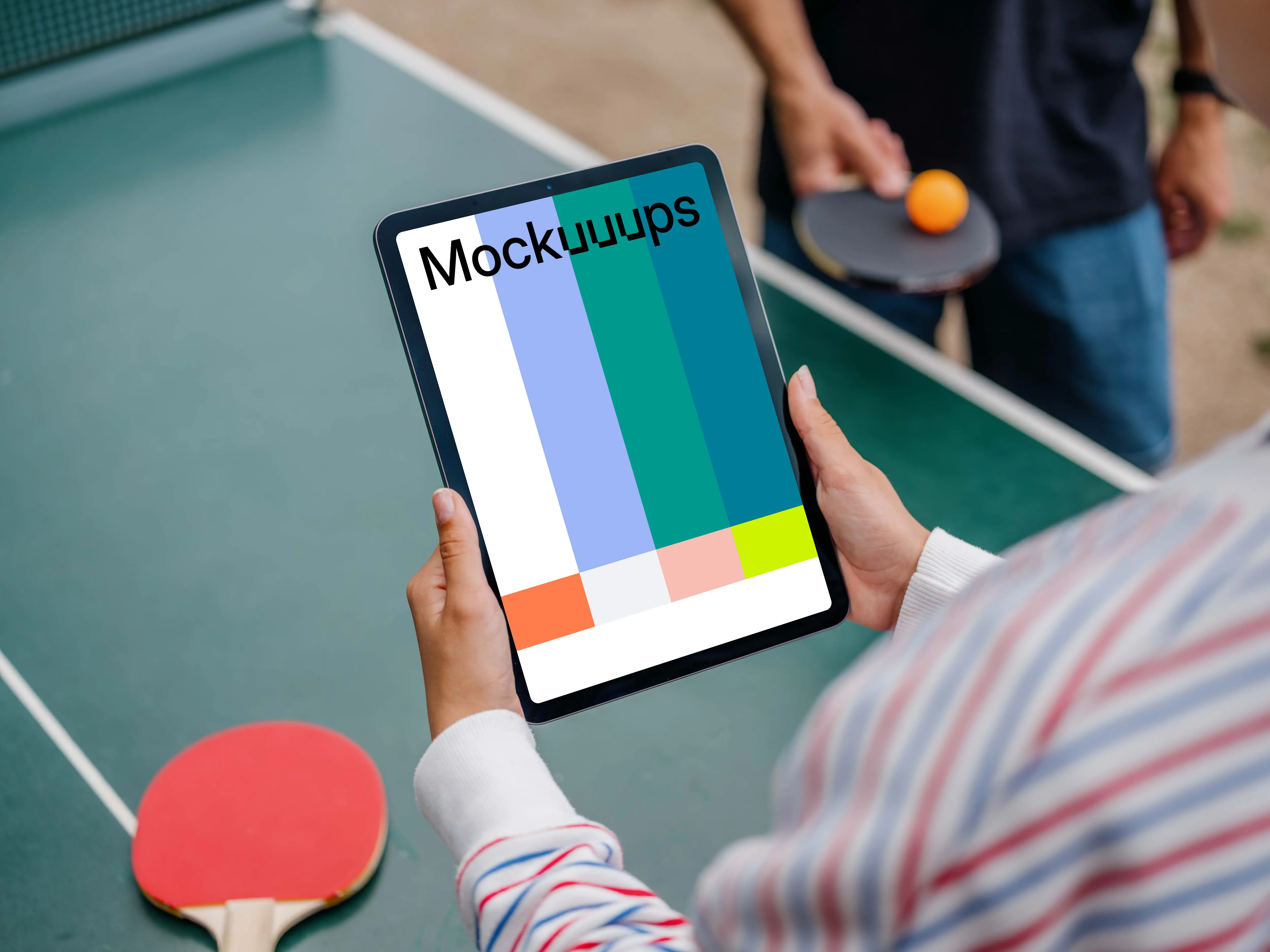 Female ping-pong player holding a tablet mockup