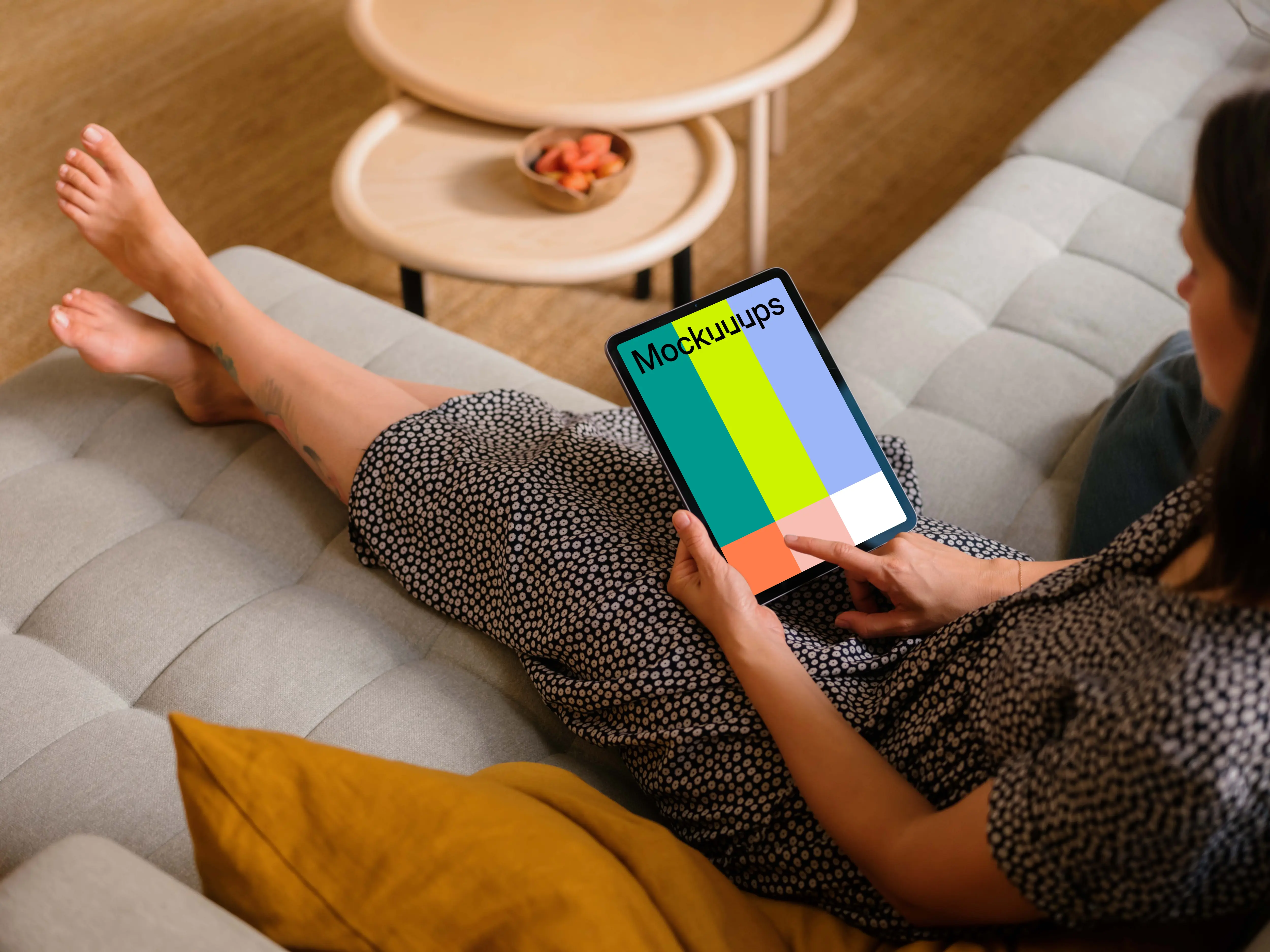 Female typing on an iPad Air mockup