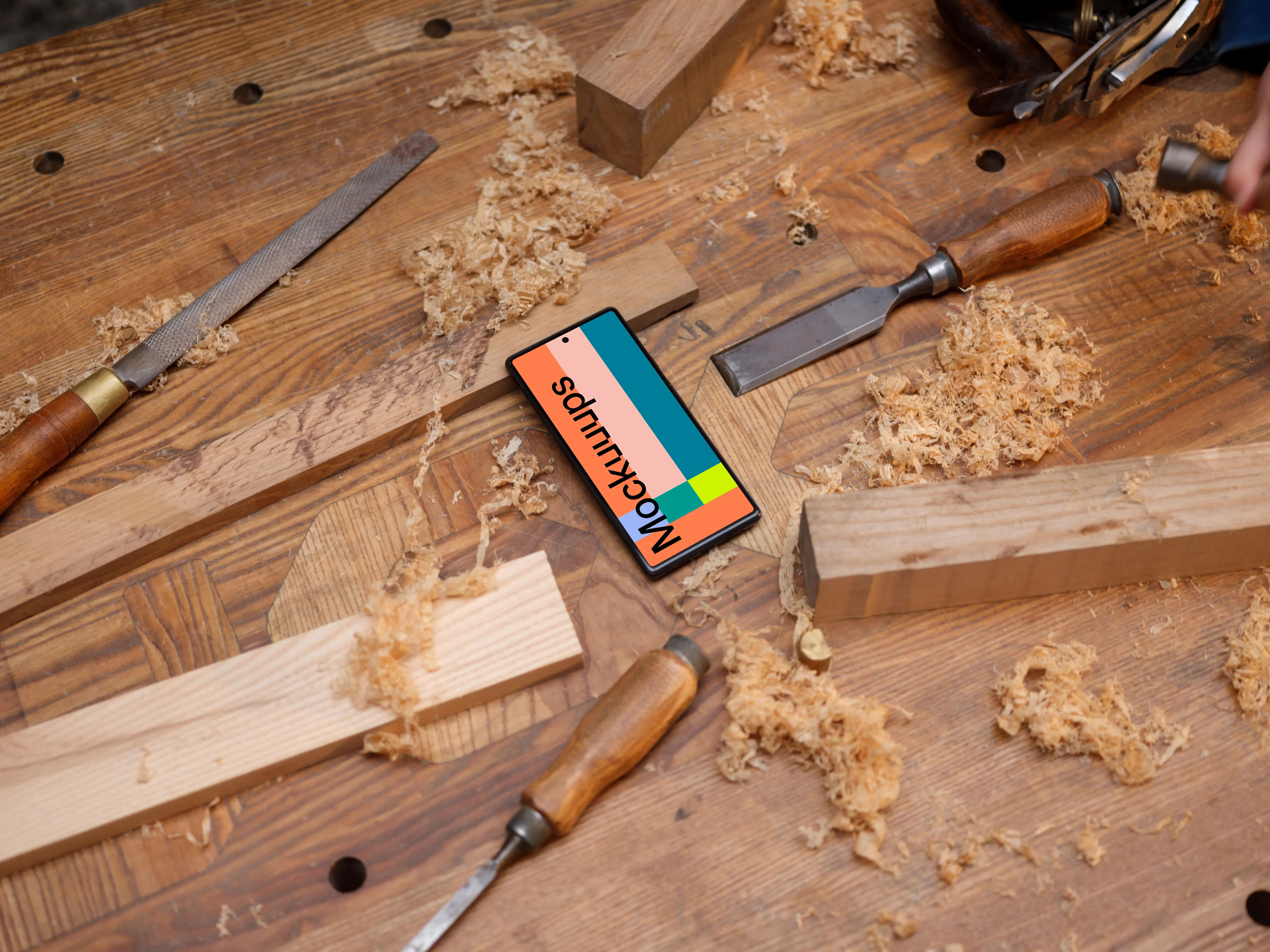 Google Pixel 6 mockup placed on a workdesk