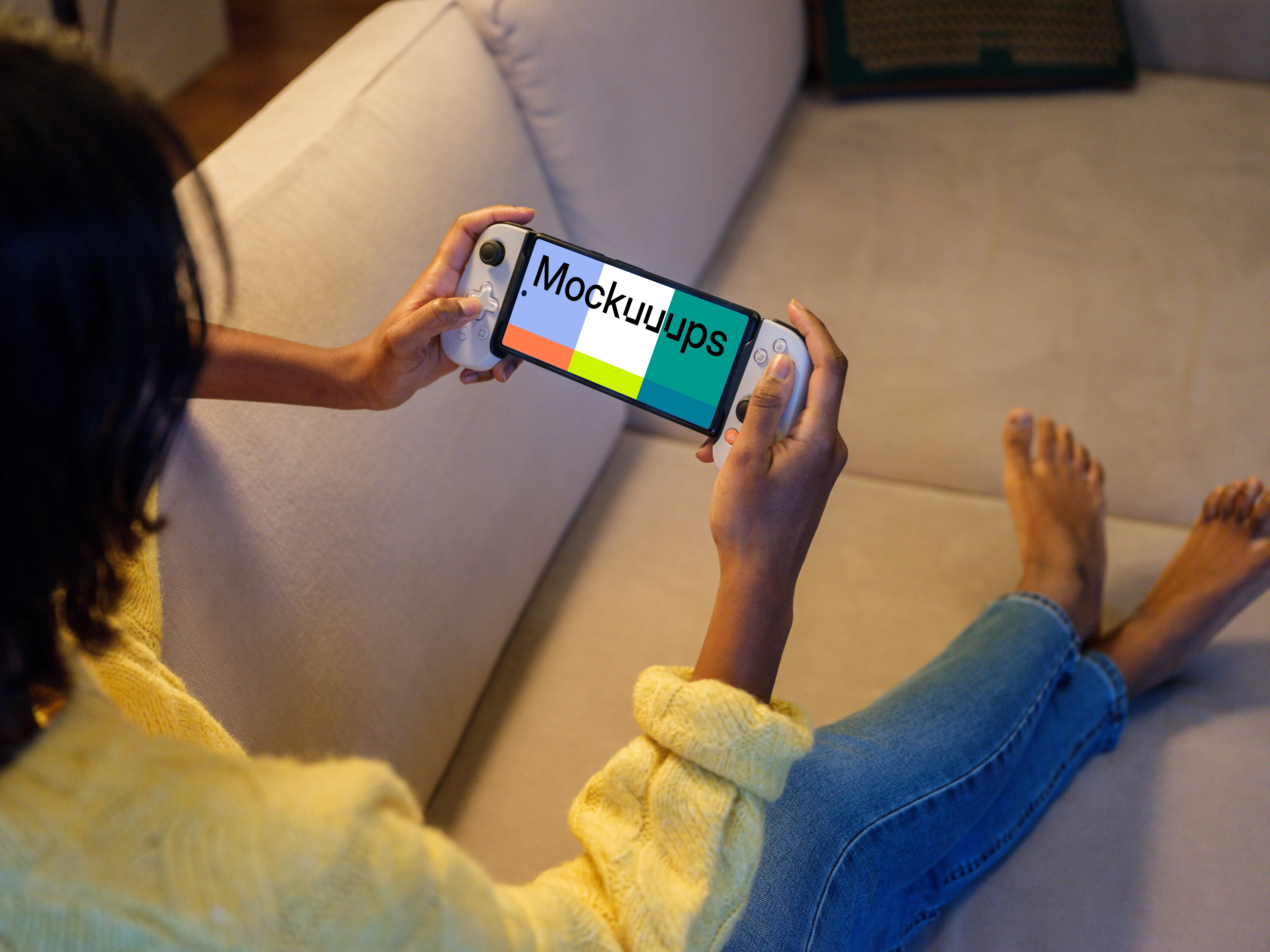 Google Pixel 6 mockup with gaming grip in a cozy living room