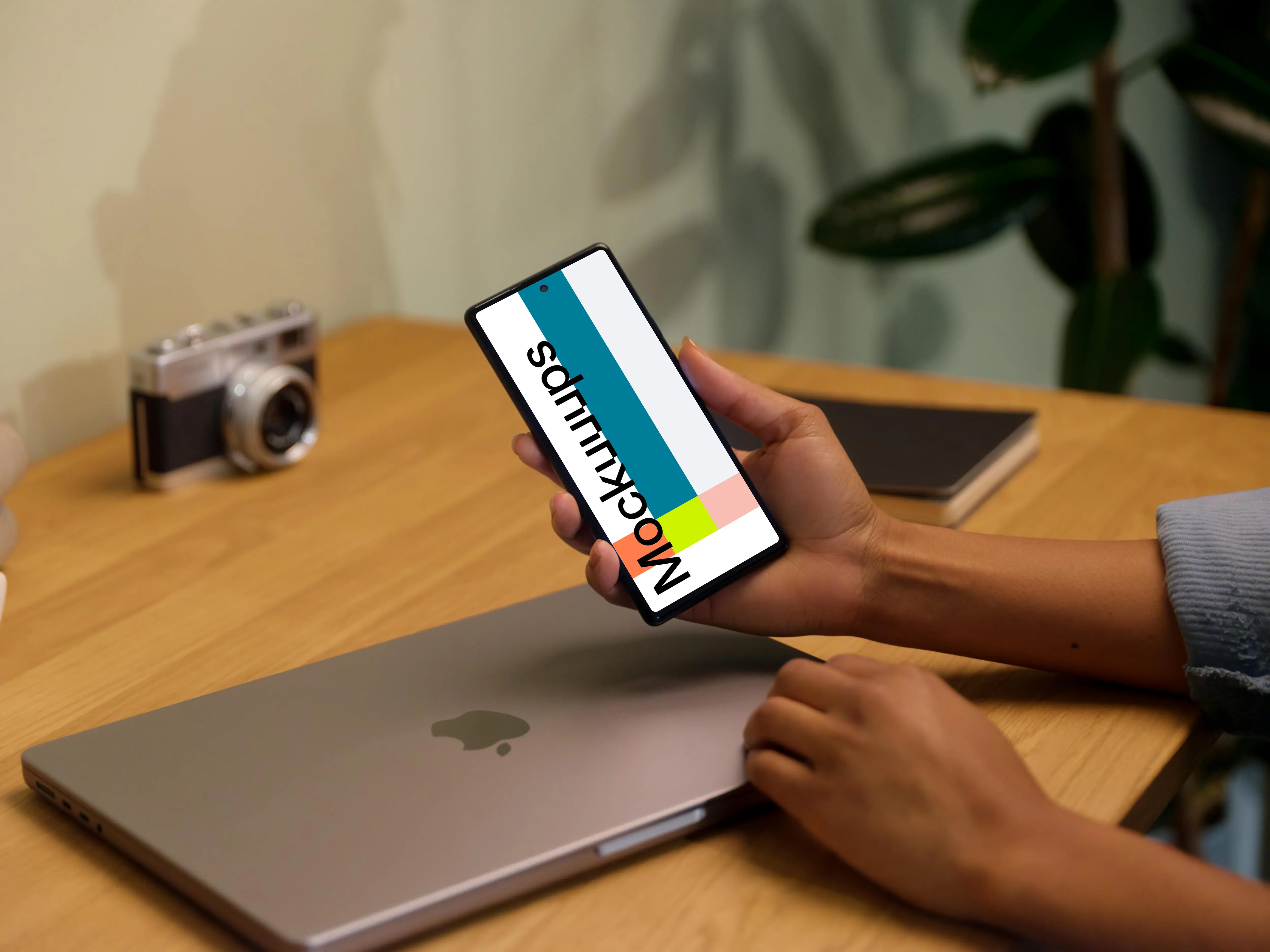 Hand holding a Google Pixel 6 mockup