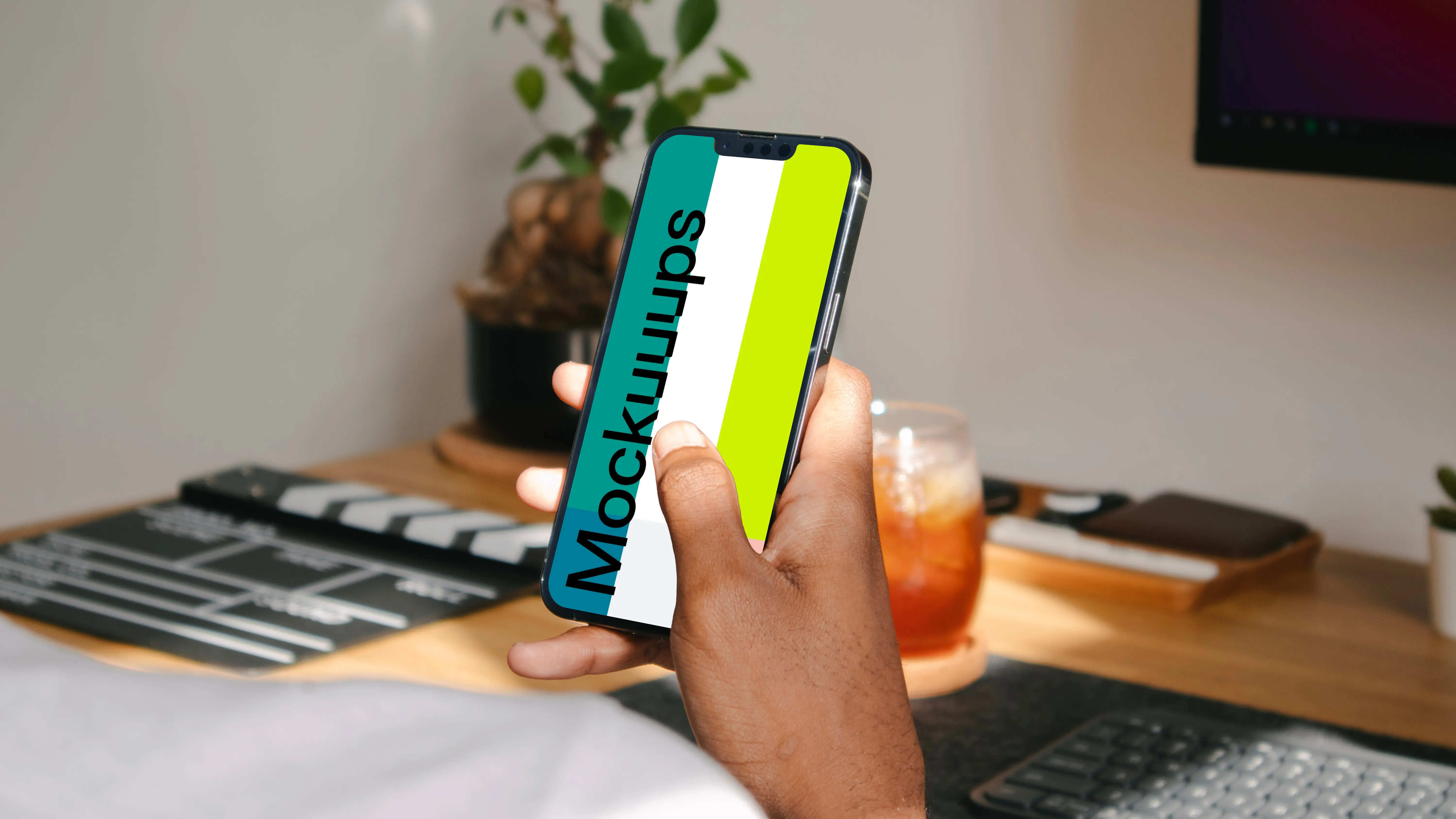 Hand holding a smartphone mockup