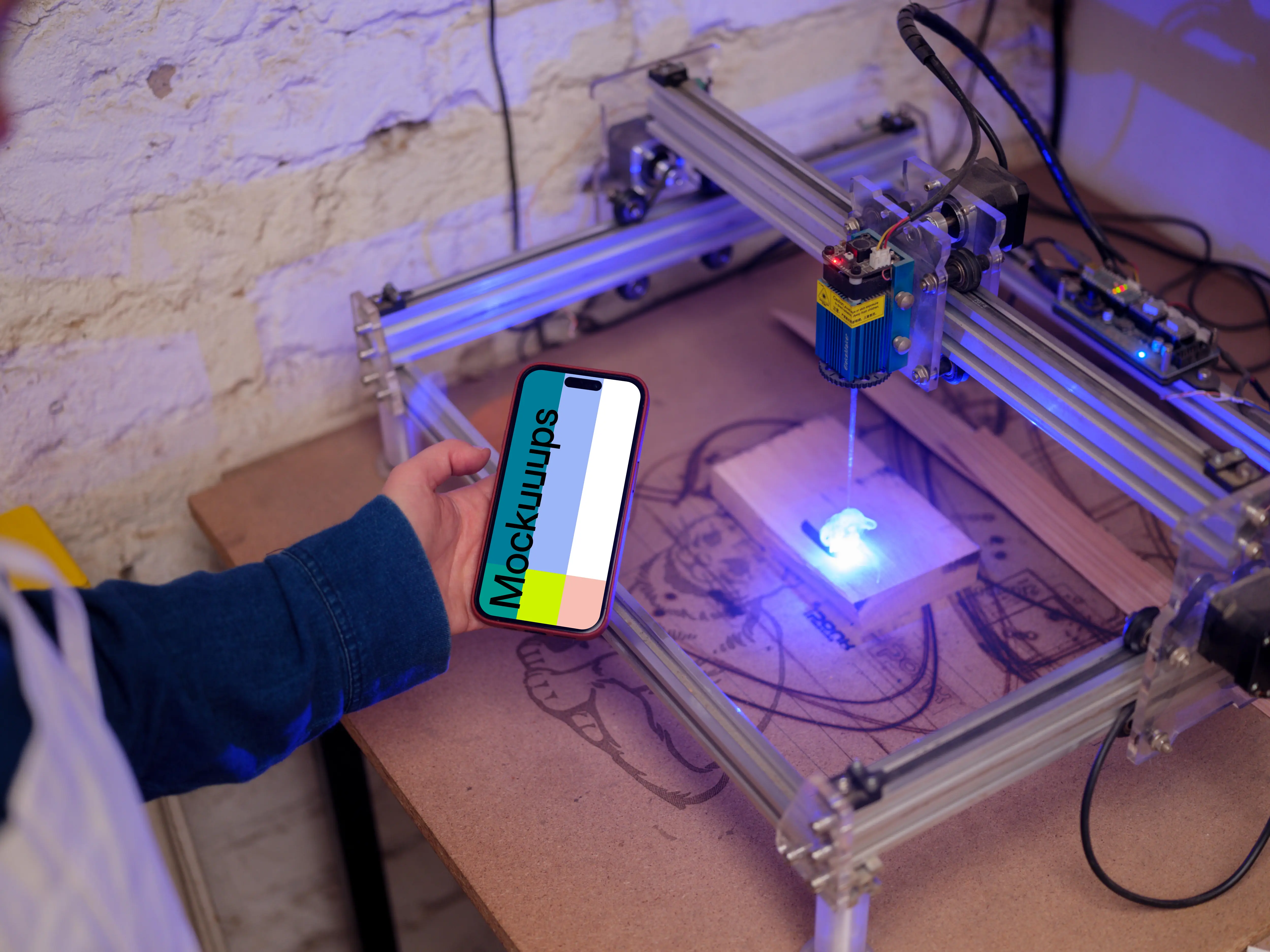 Hand holding an iPhone 14 Pro mockup