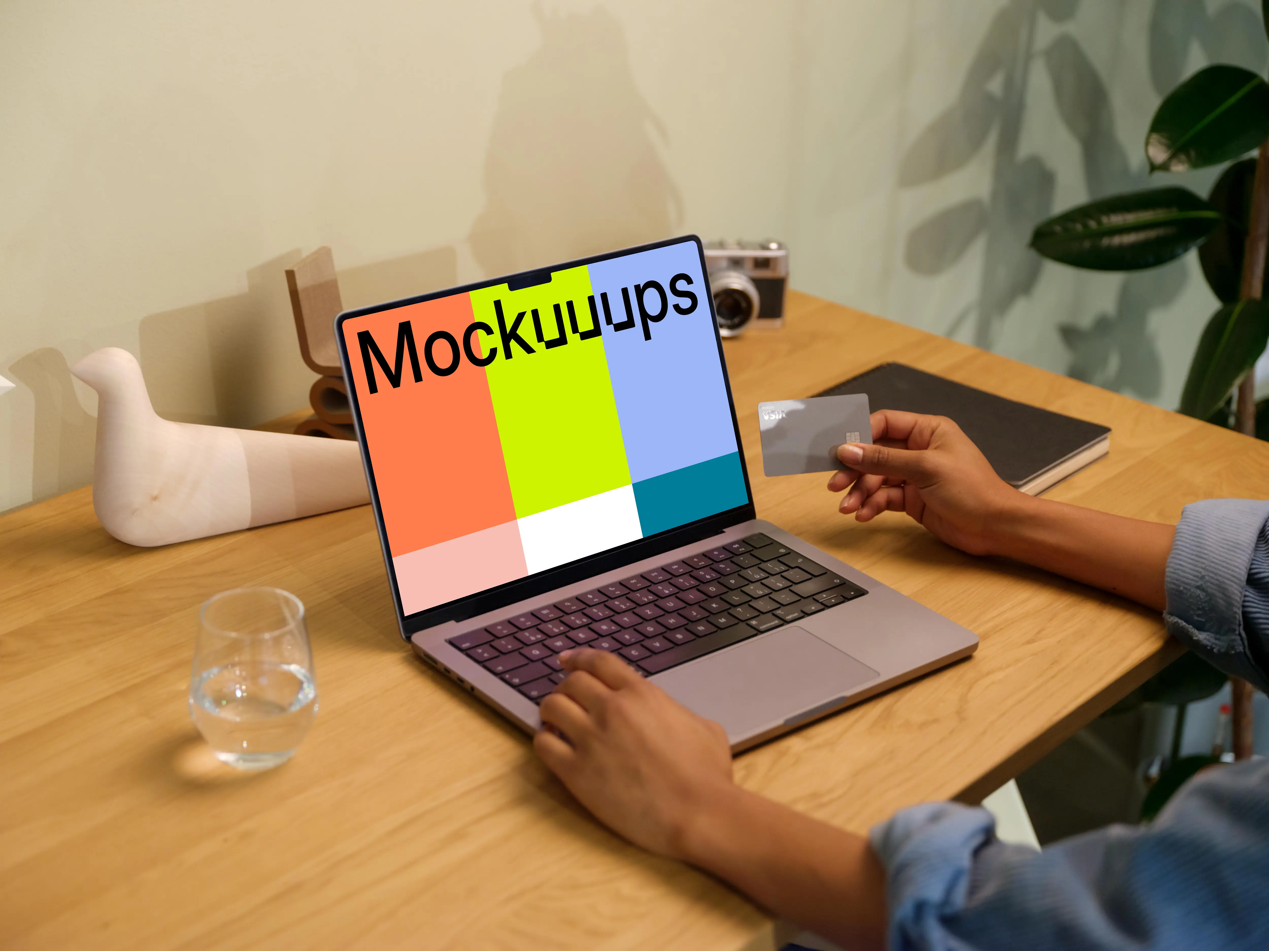 Hand typing on a MacBook Pro mockup