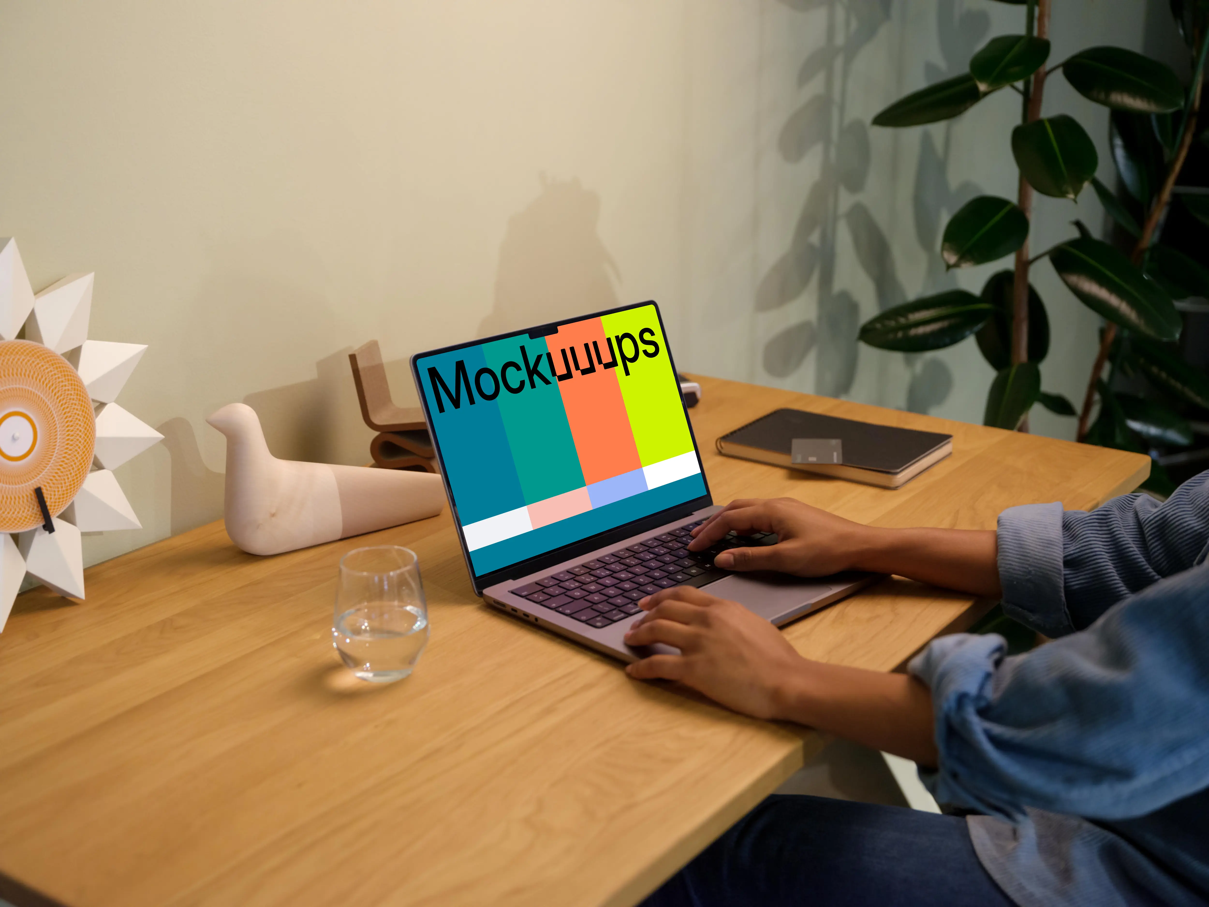 Hands typing on a MacBook Pro 14 mockup