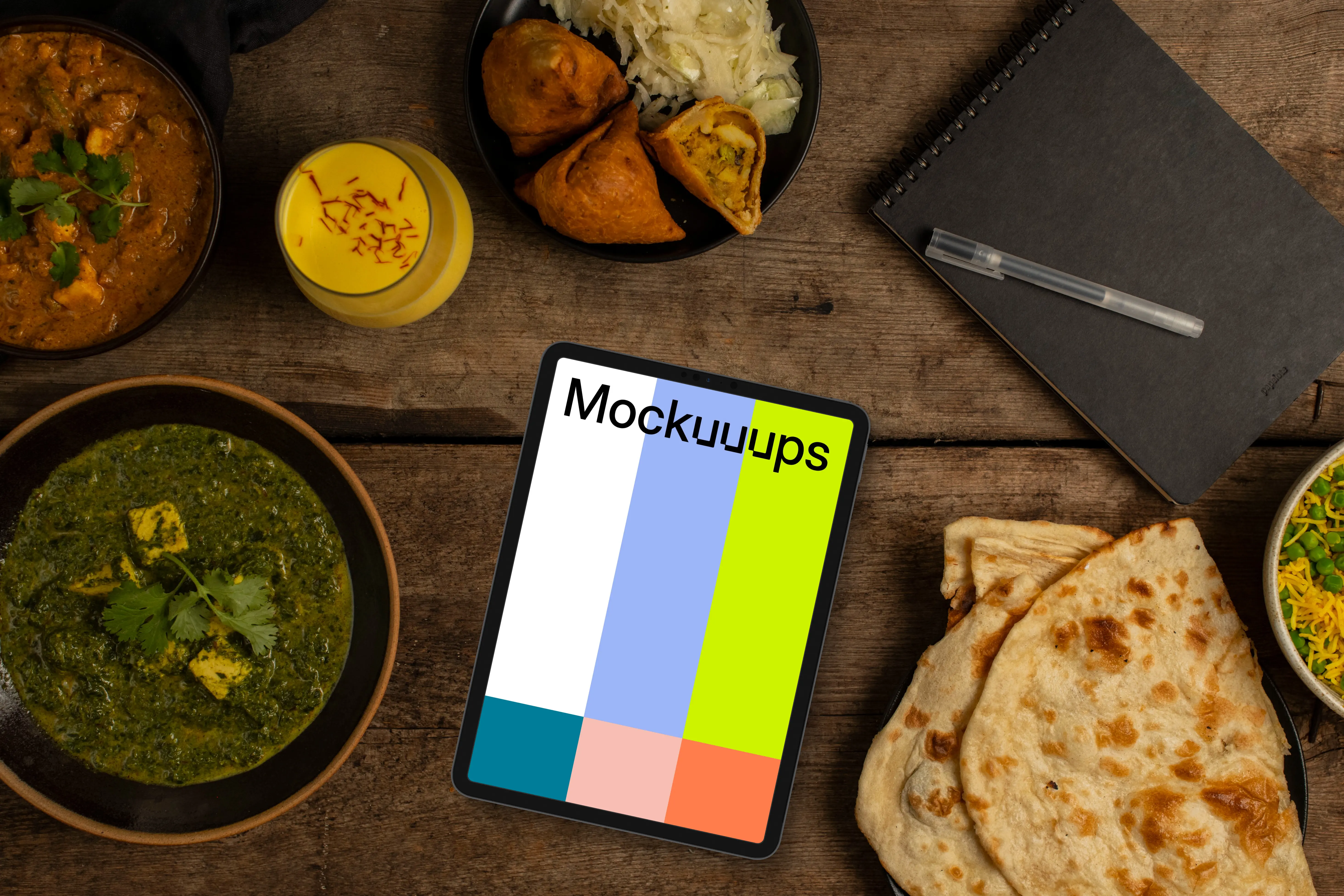 Indian food around tablet mockup