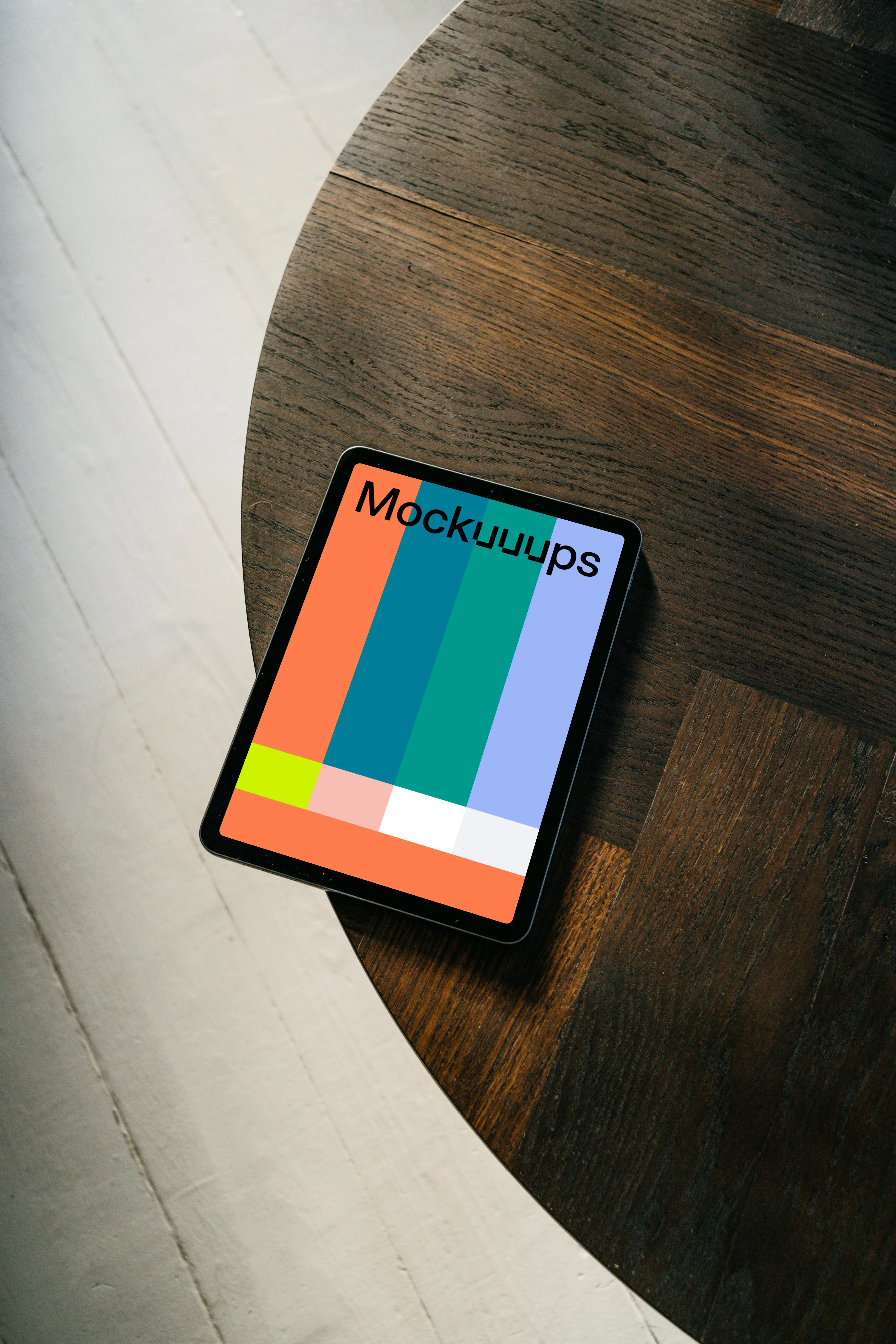iPad Air mockup on a dark brown table