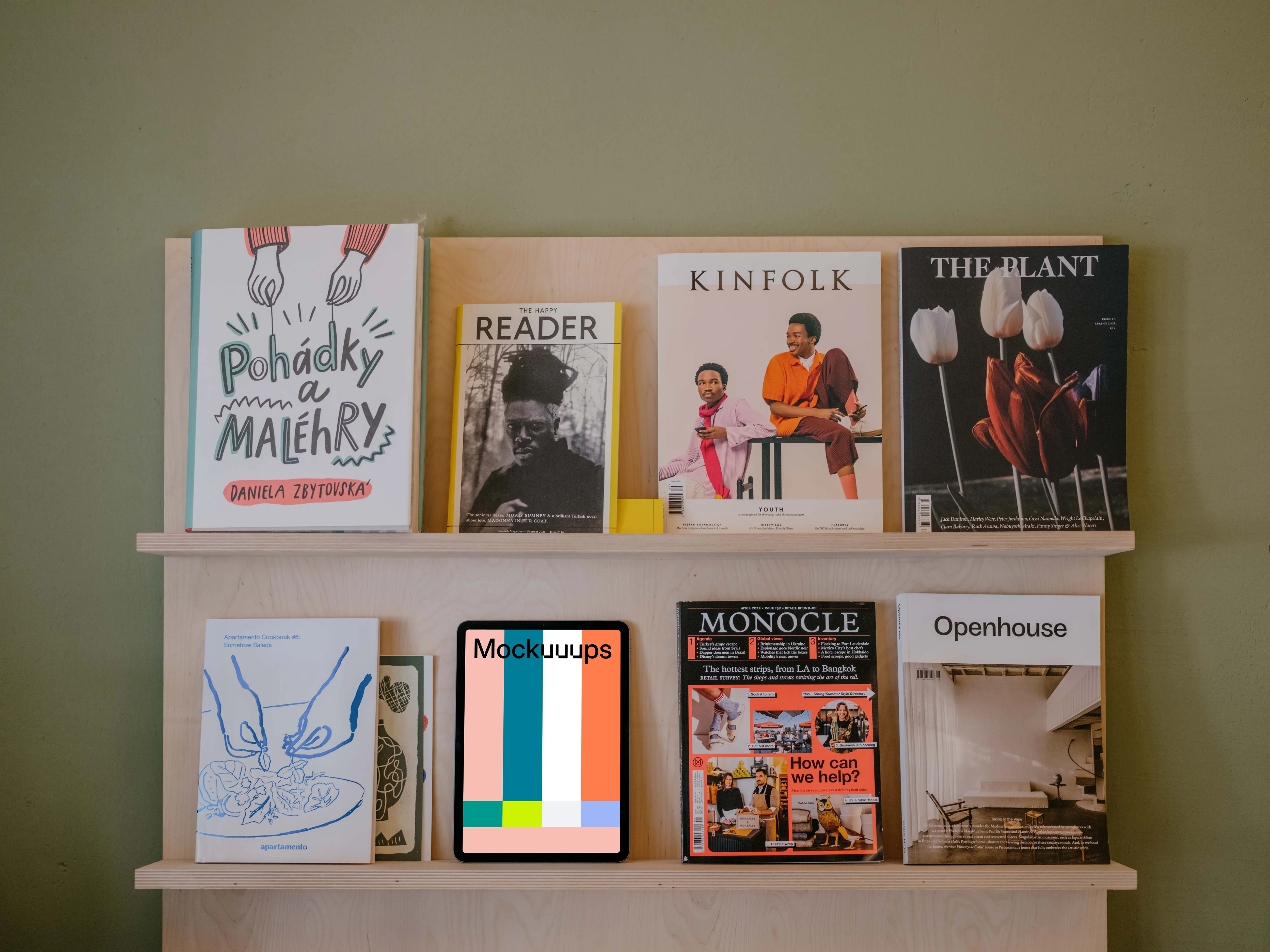 iPad Air mockup on the wall with magazines