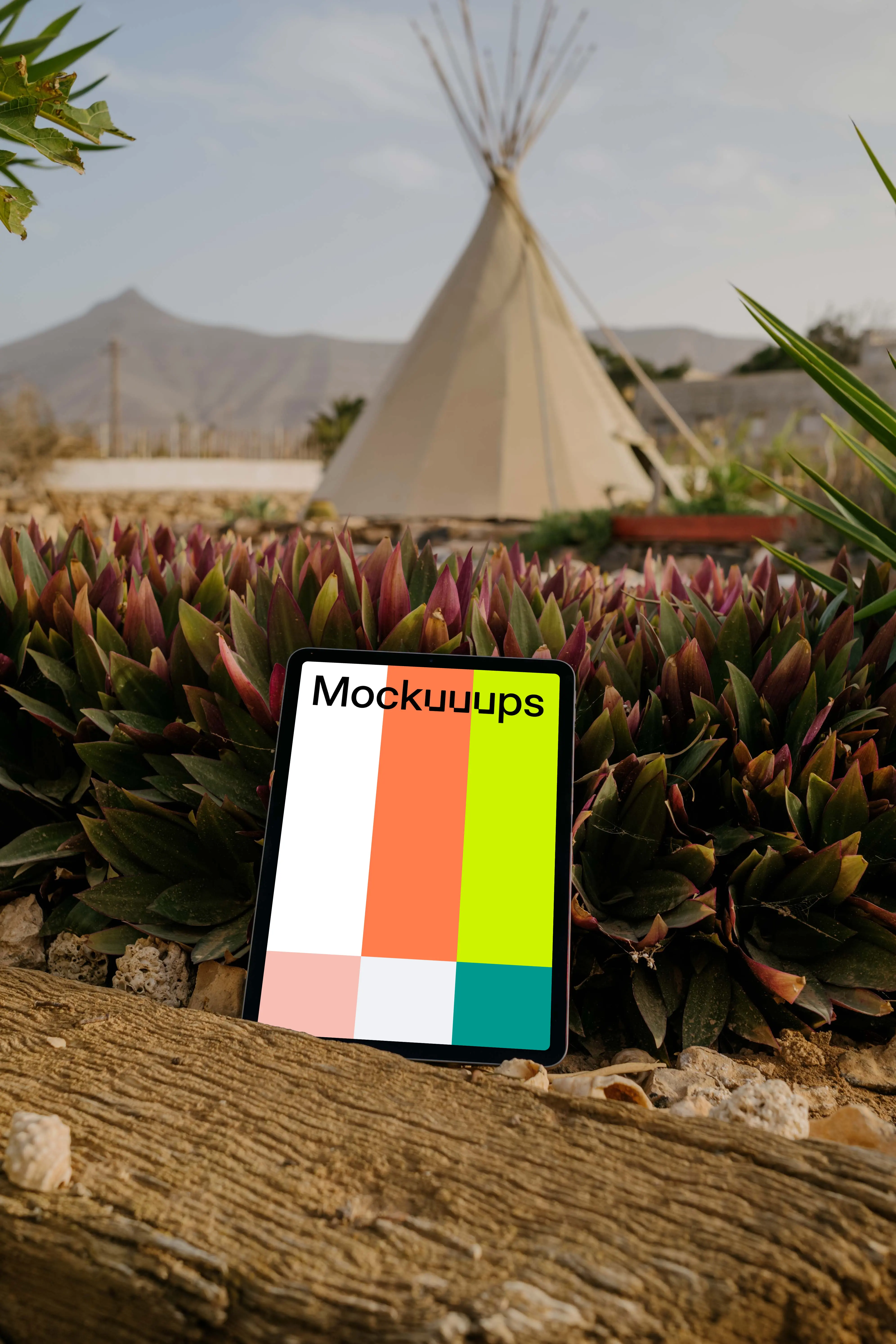 iPad Air mockup placed against some plants