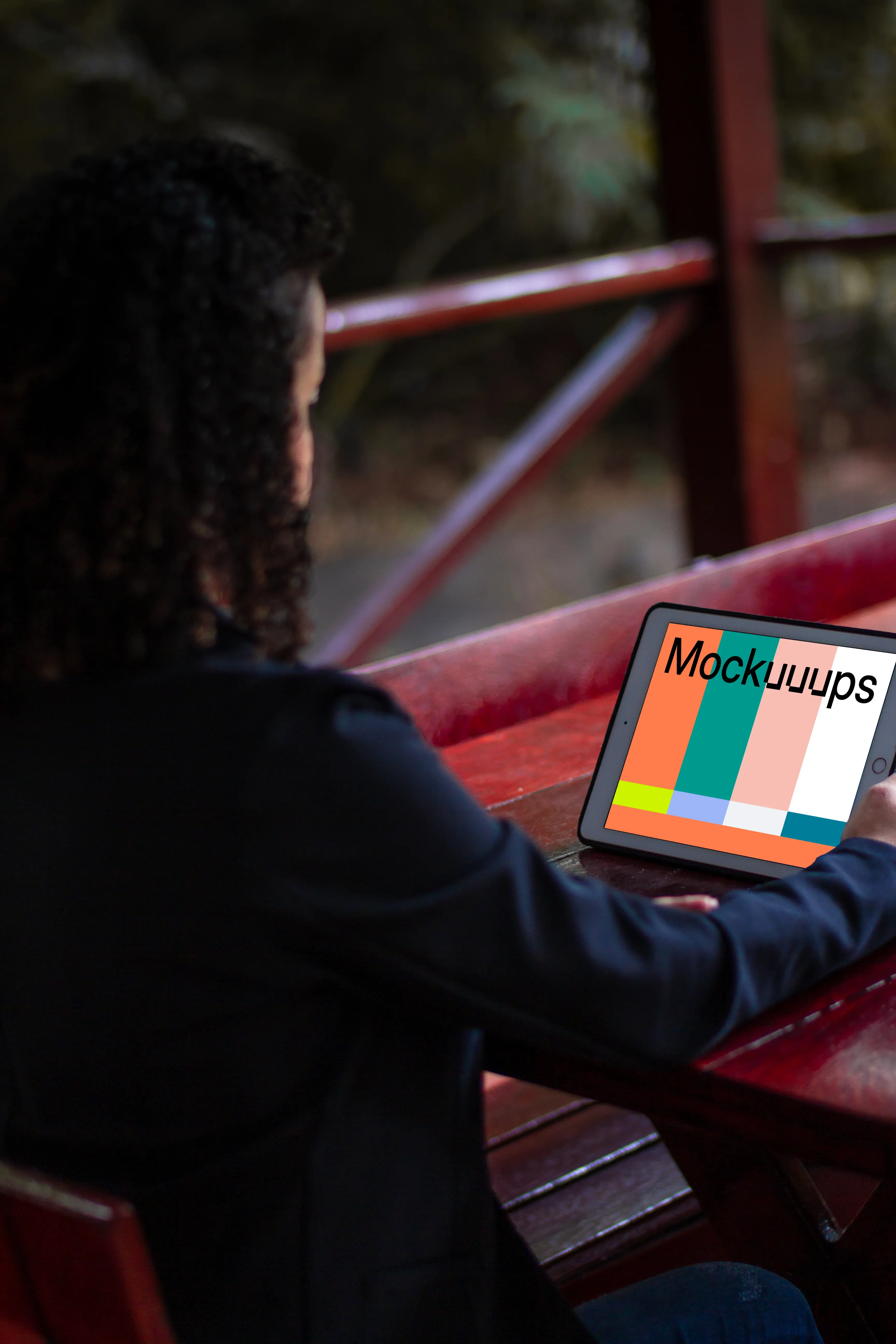 iPad Mini mockup held by female user