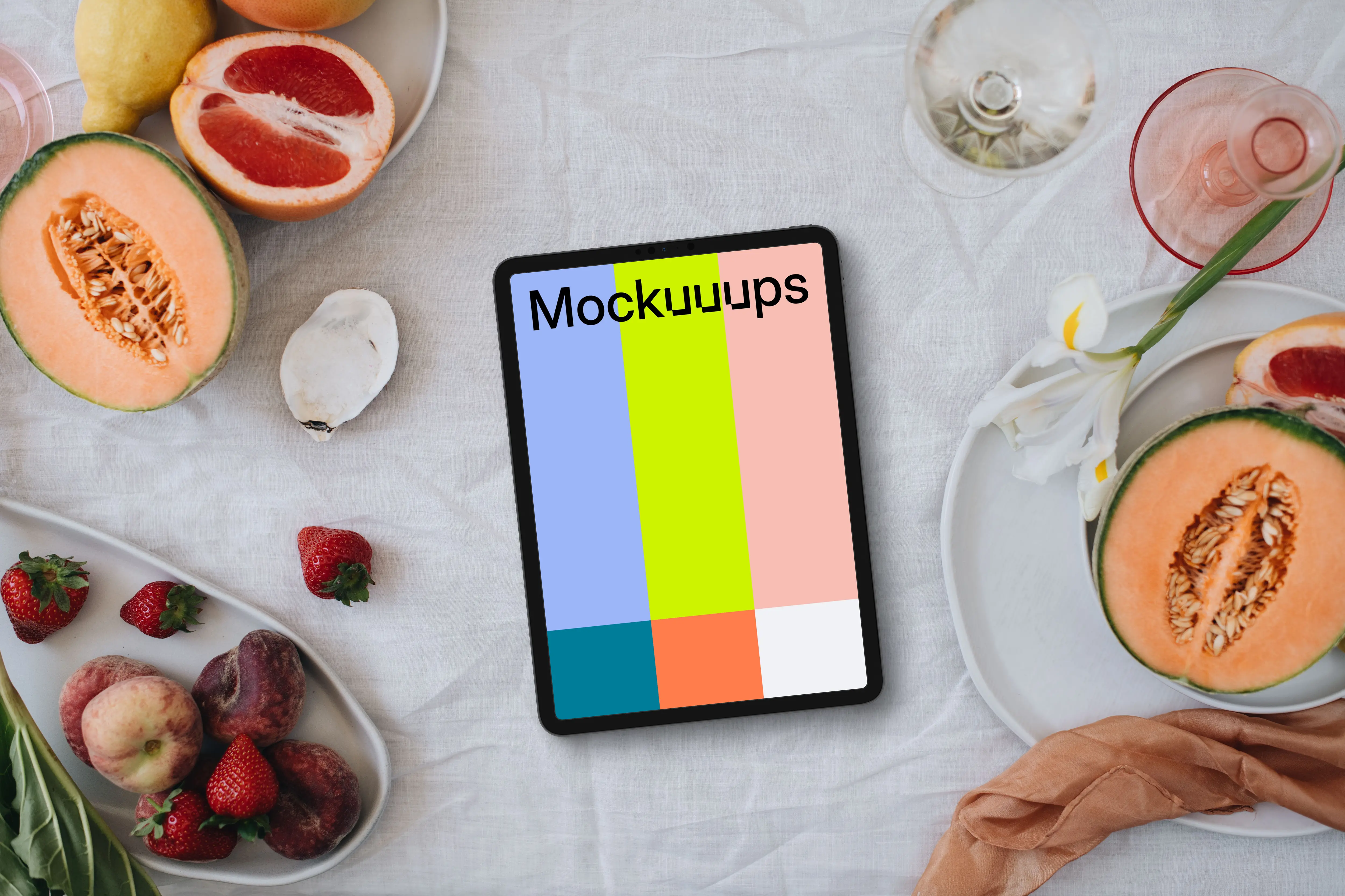 iPad mockup complemented by wedding-themed decor