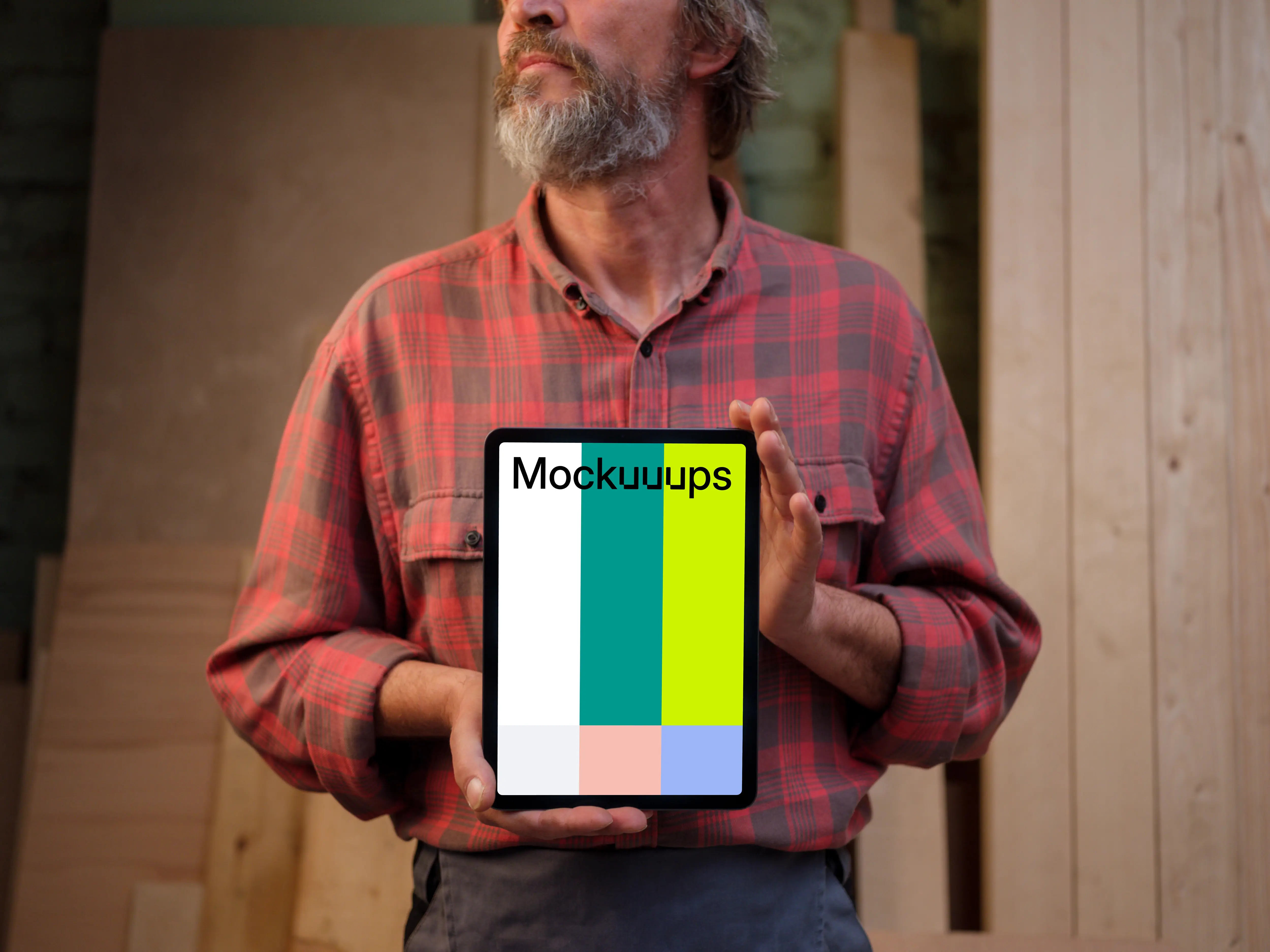 iPad mockup held by a repairman
