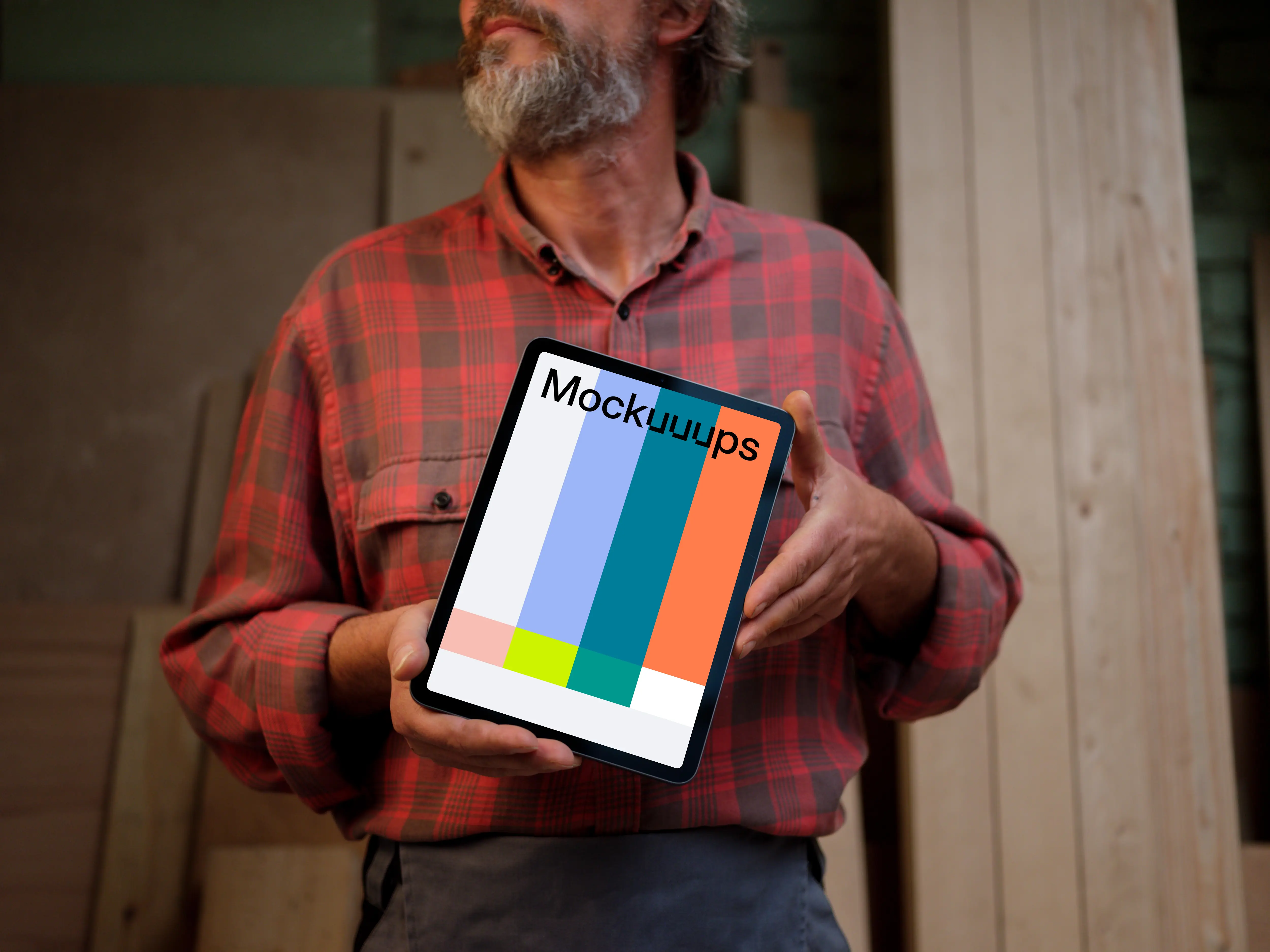 iPad mockup in man hands
