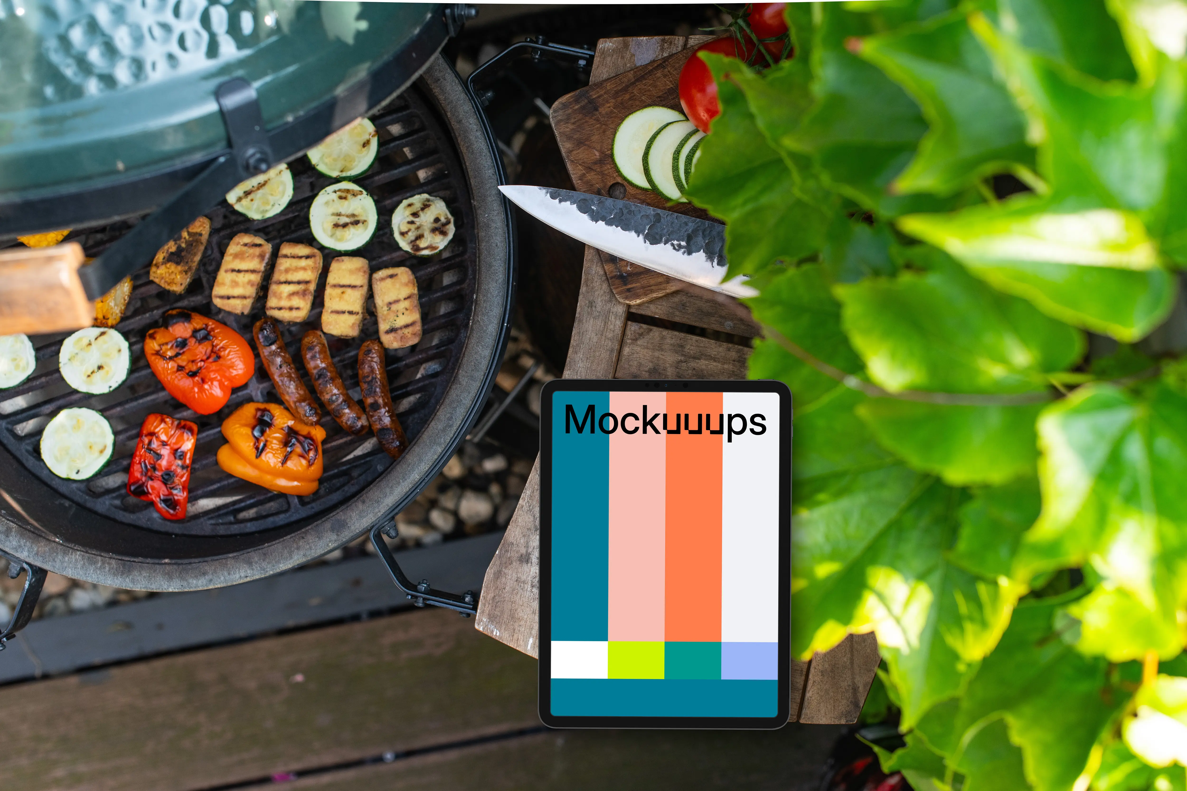 iPad mockup with grilled vegetables next to it