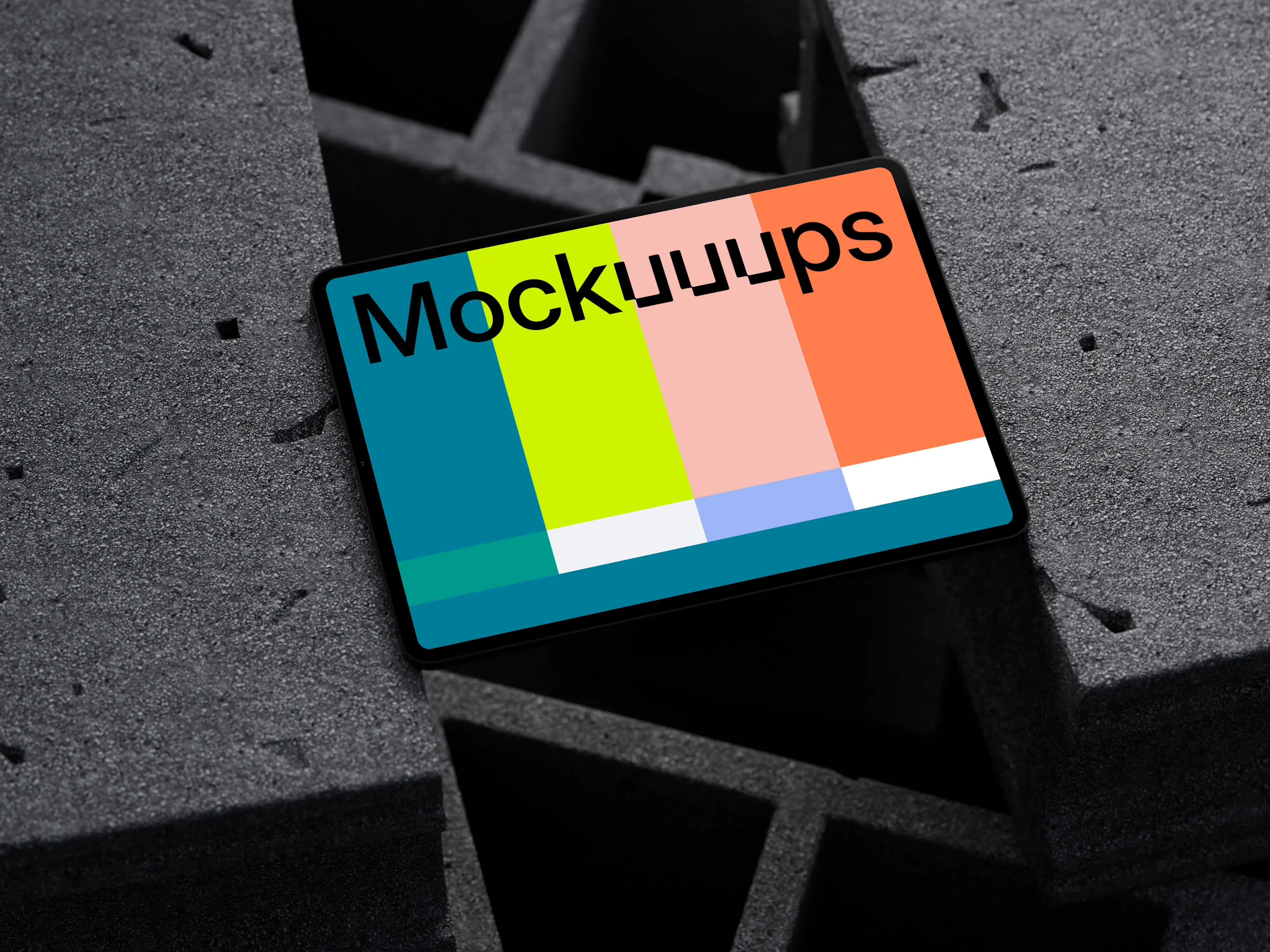 iPad Pro mockup on textured concrete blocks