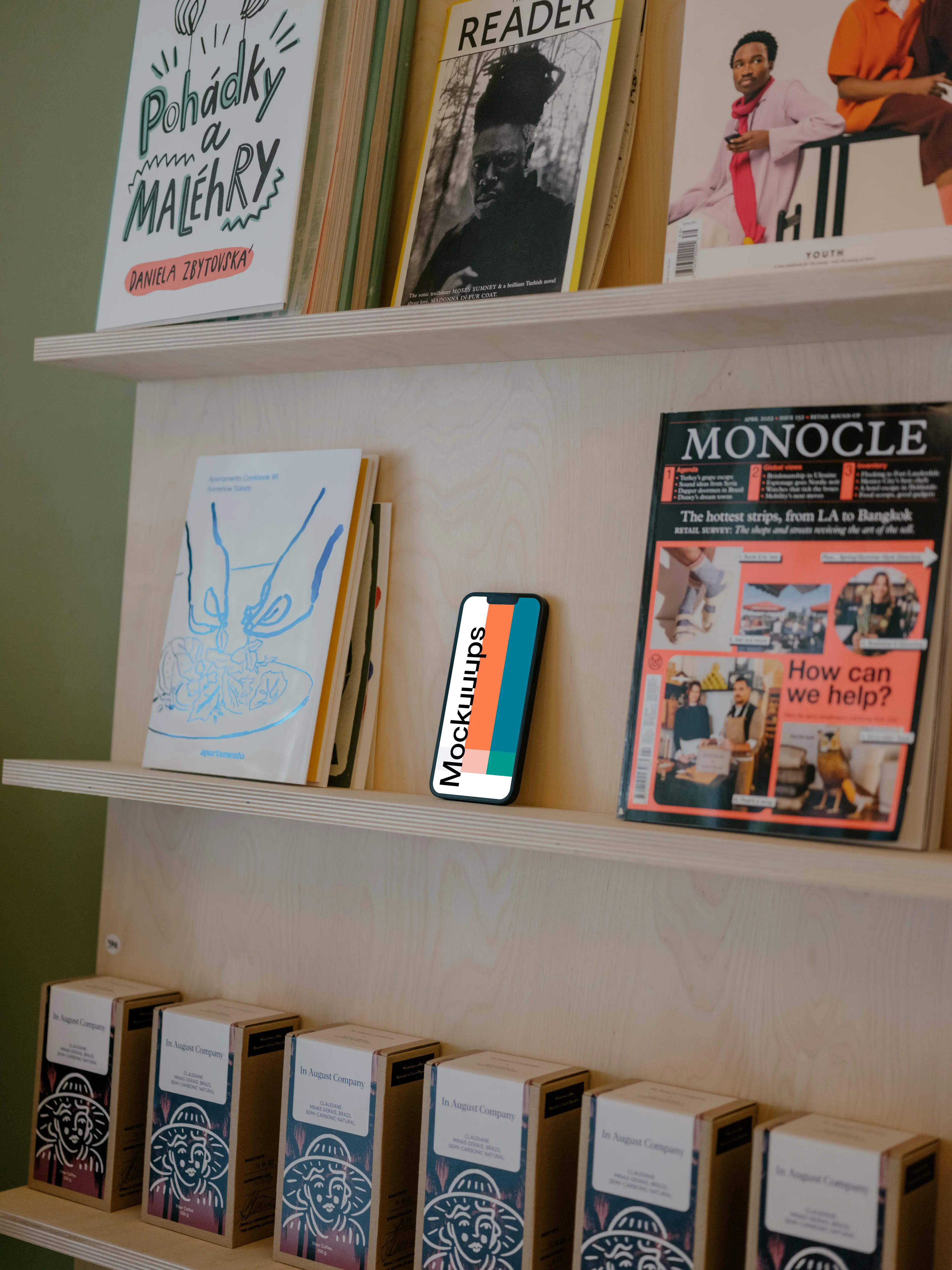 iPhone 13 mockup on bookshelf