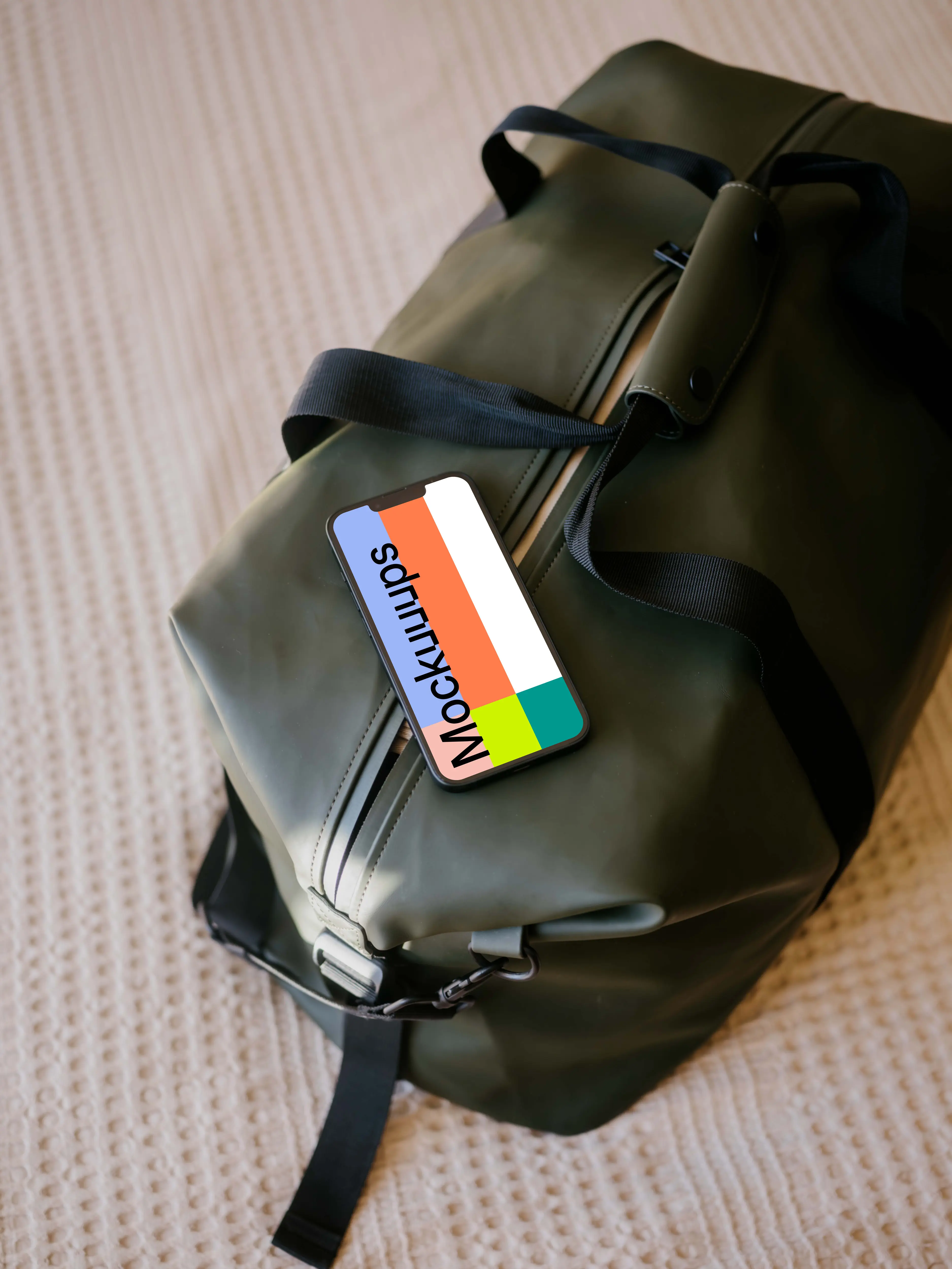 iPhone 13 mockup on travel bag