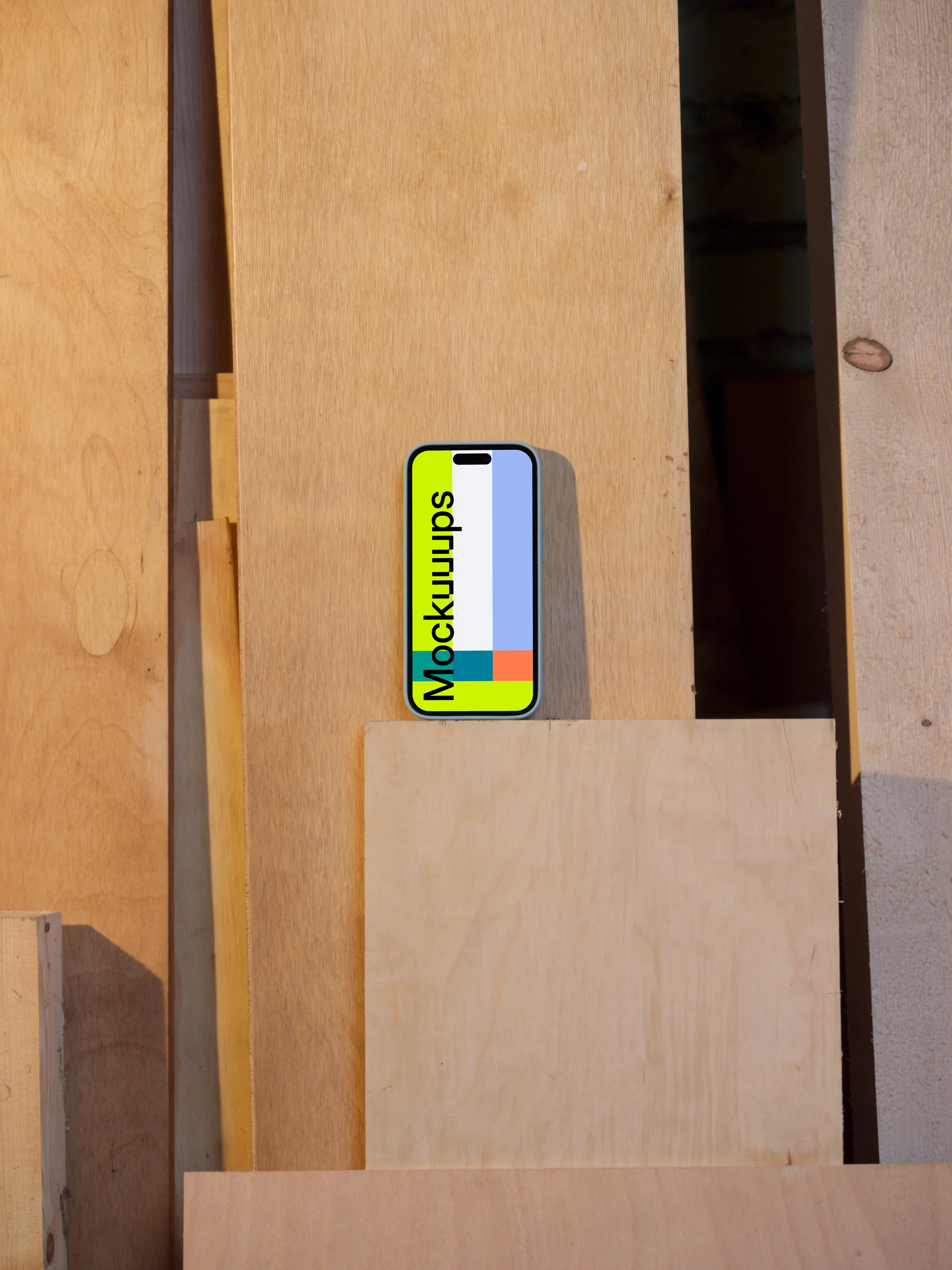 iPhone 14 Pro mockup placed on a wooden board