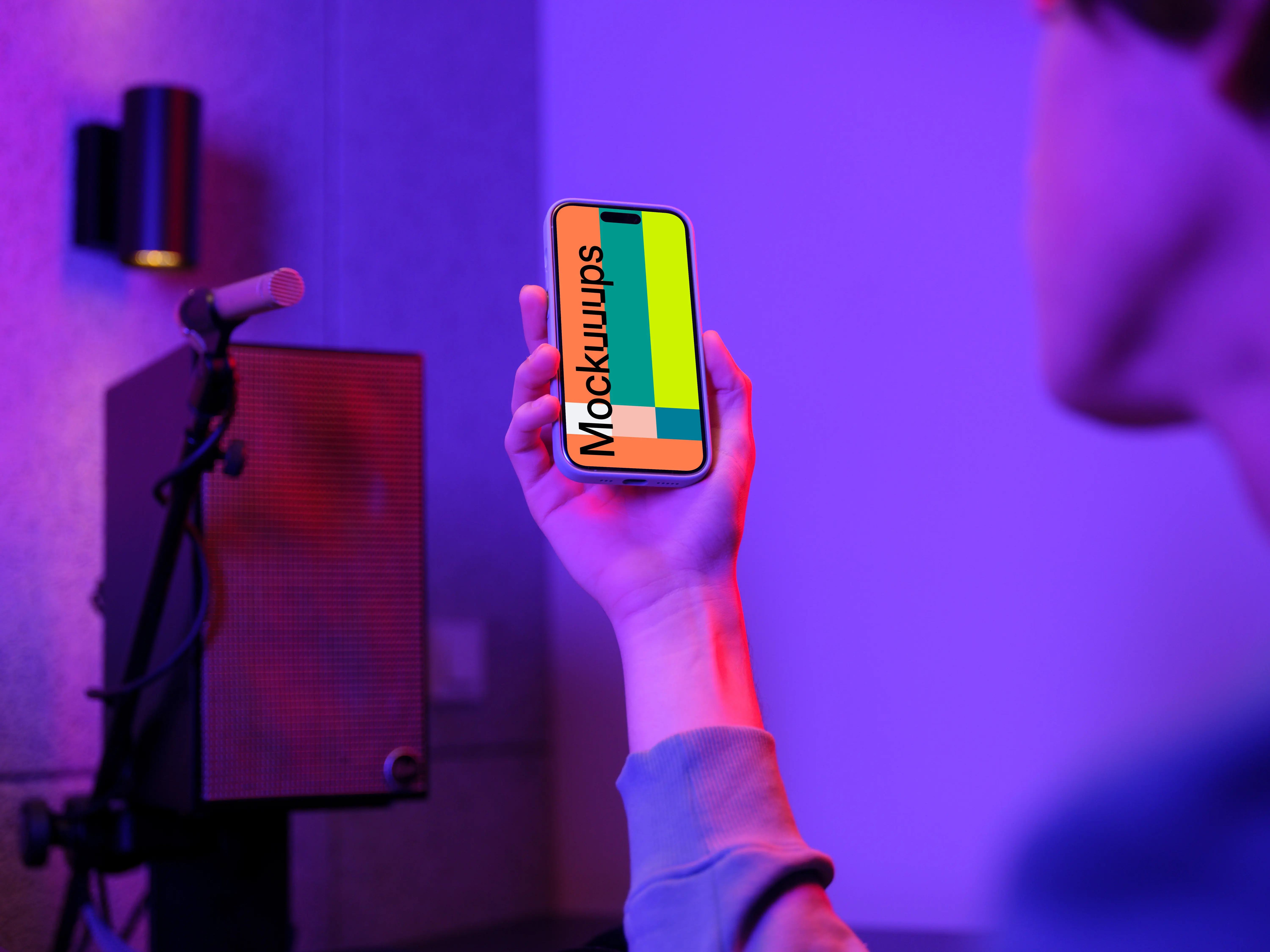 iPhone 15 Pro mockup in a gaming studio