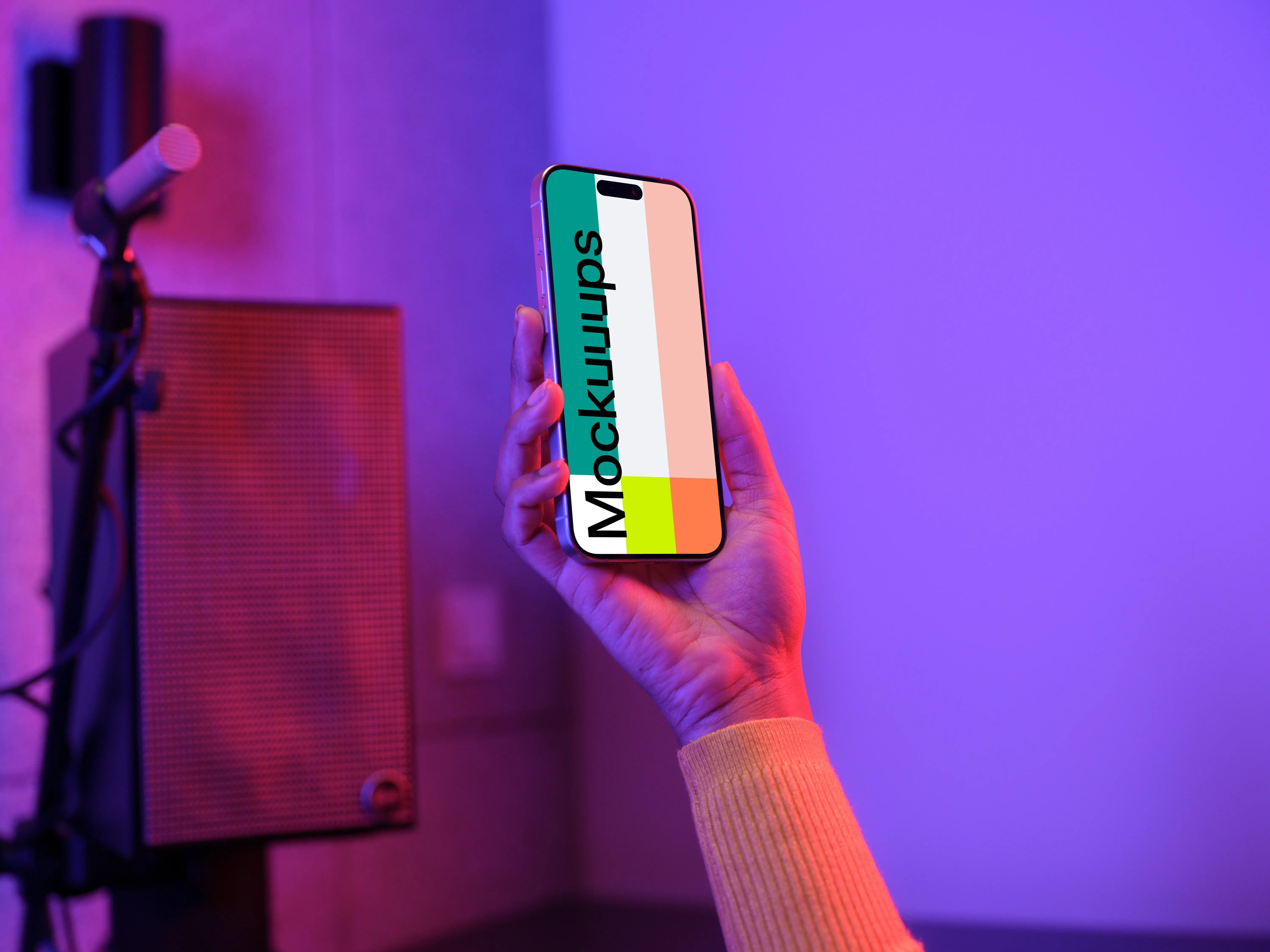 iPhone 15 Pro mockup in a vibrant gaming setup