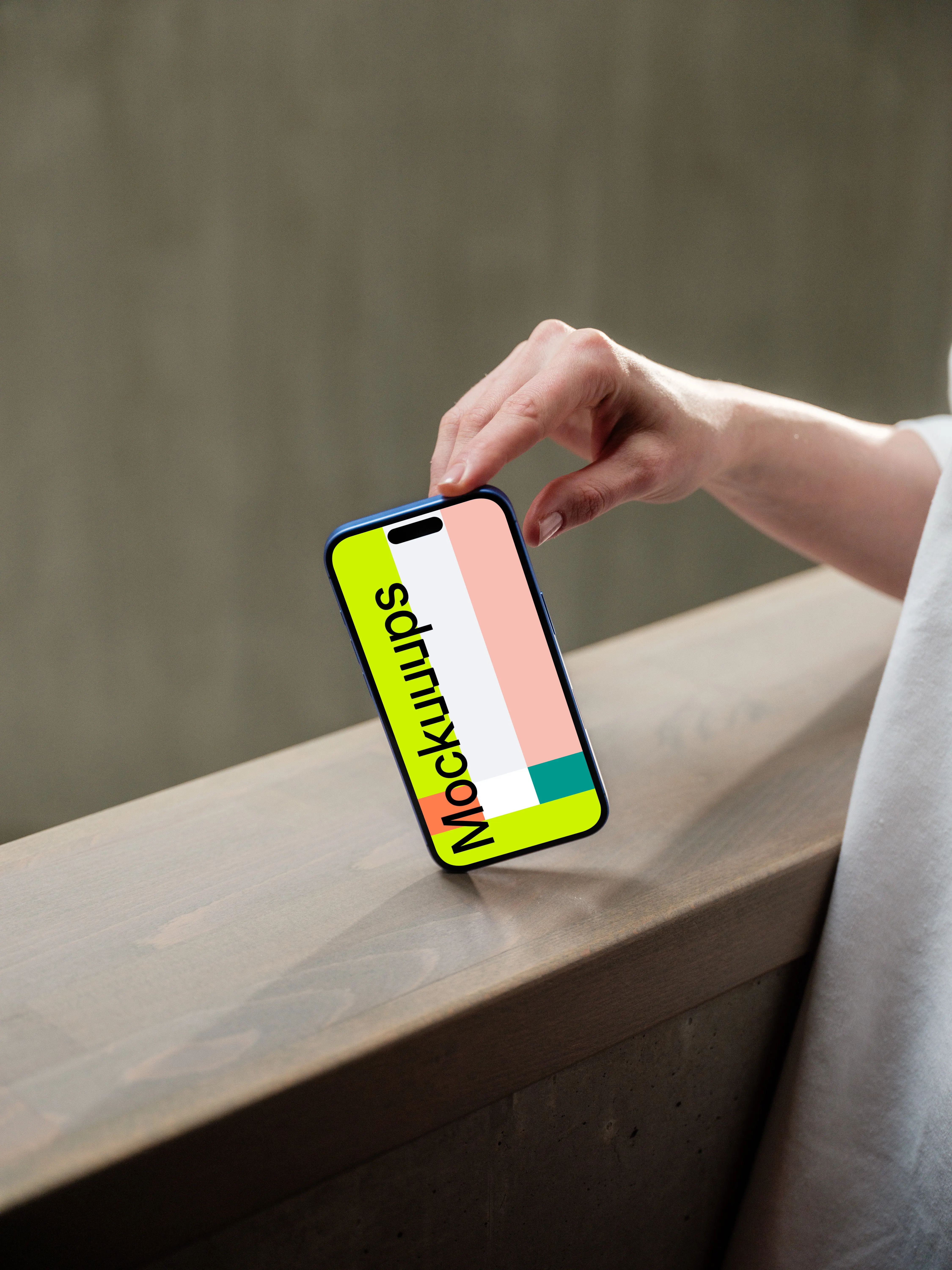 iPhone 16 mockup on industrial ledge