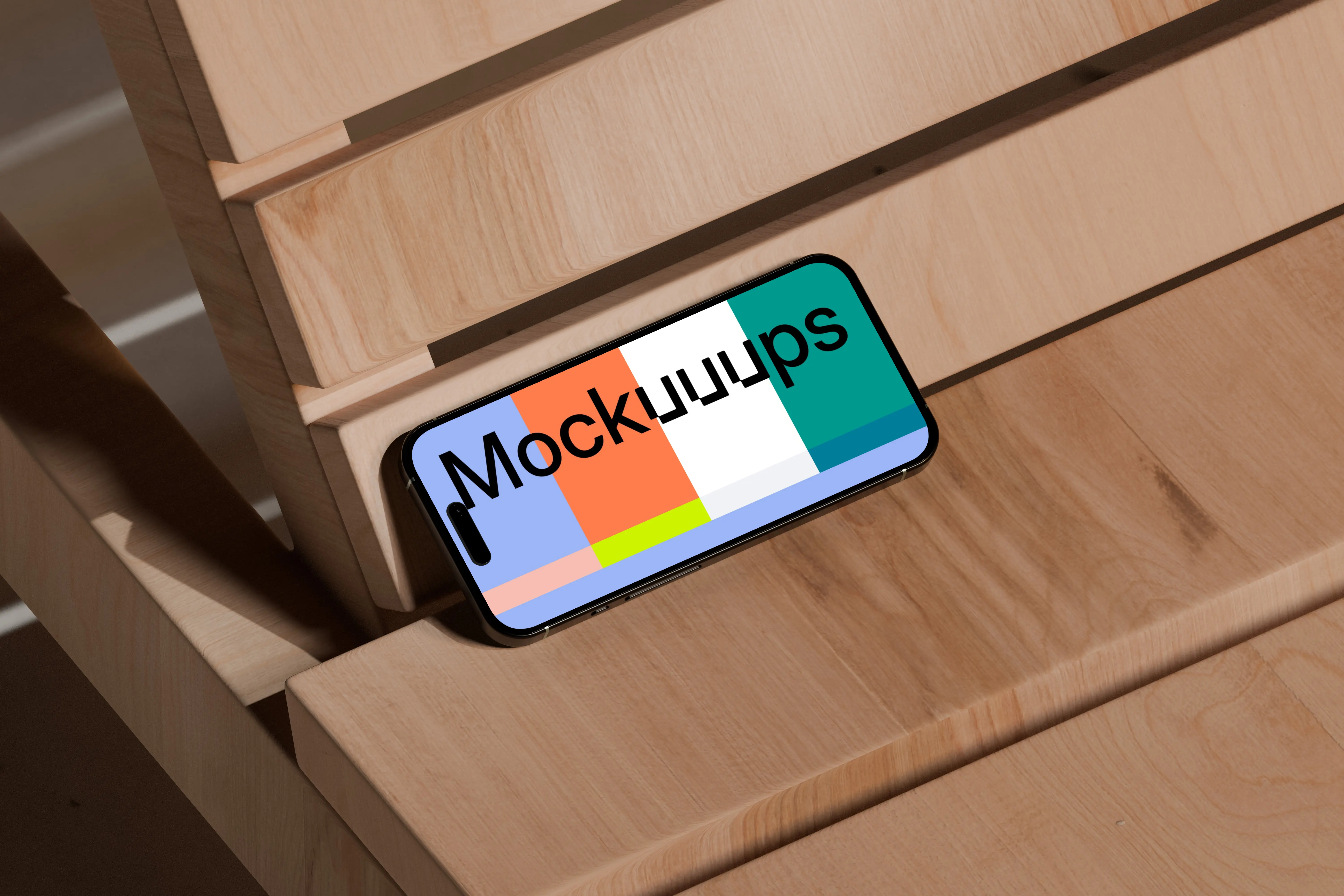 iPhone 16 mockup on wooden bench