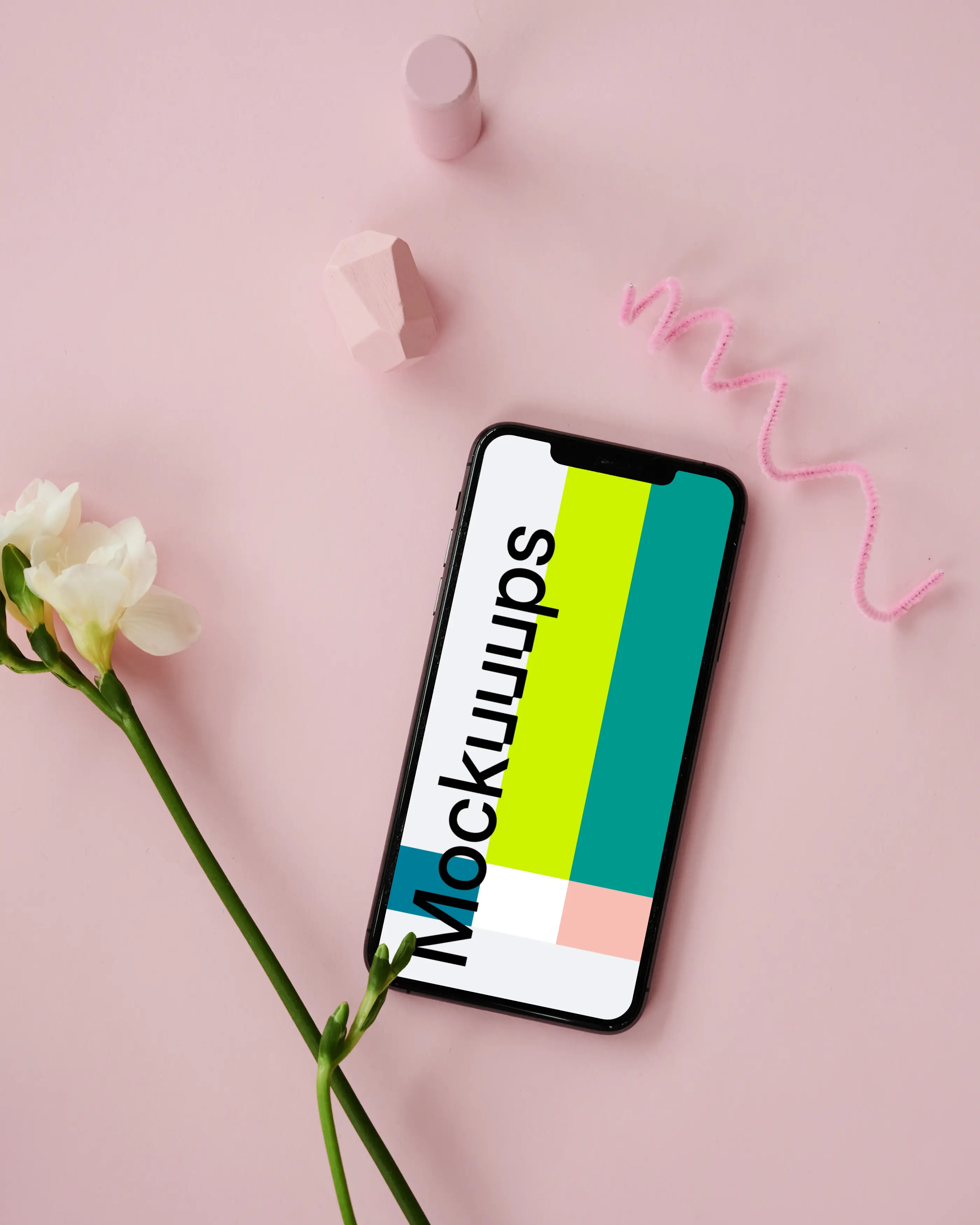 iPhone mockup beside a flower stem