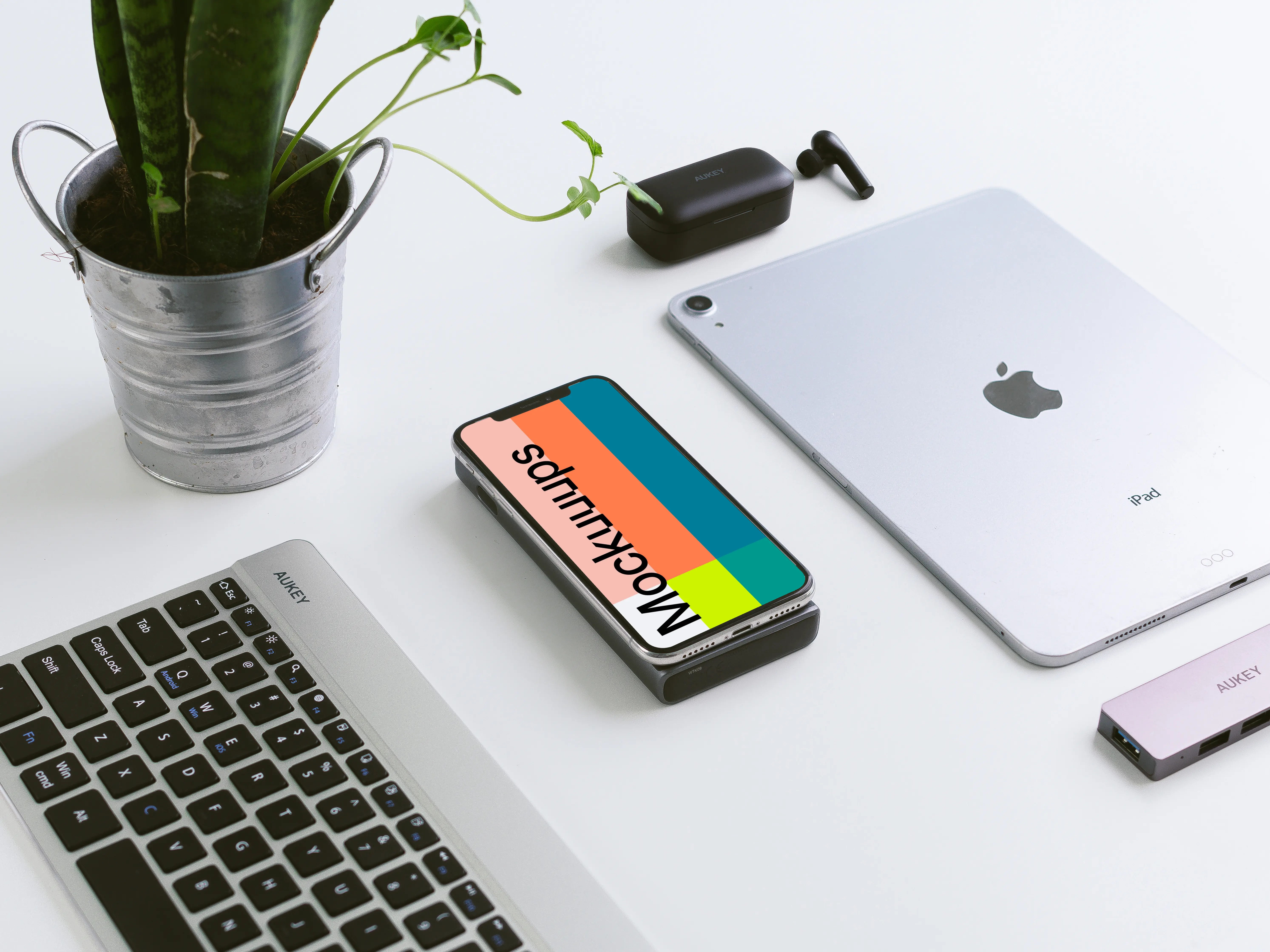 iPhone mockup beside iPad Air