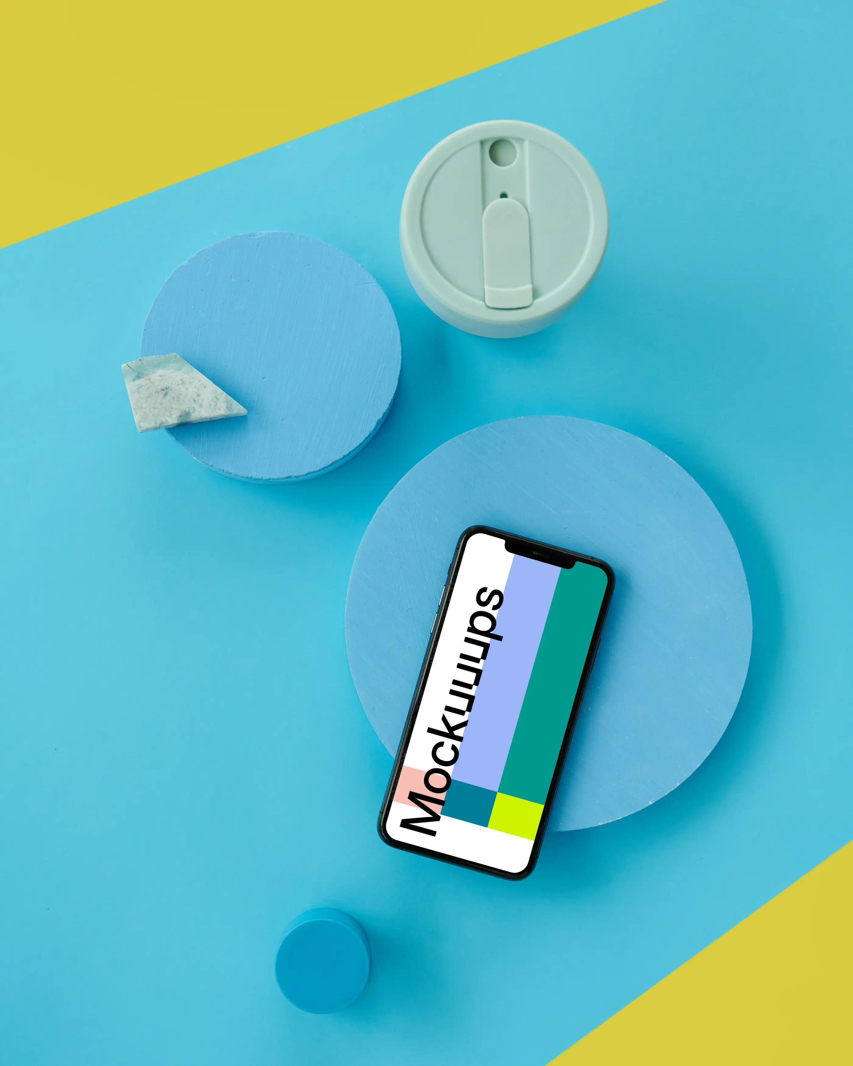 iPhone mockup on a light blue table 