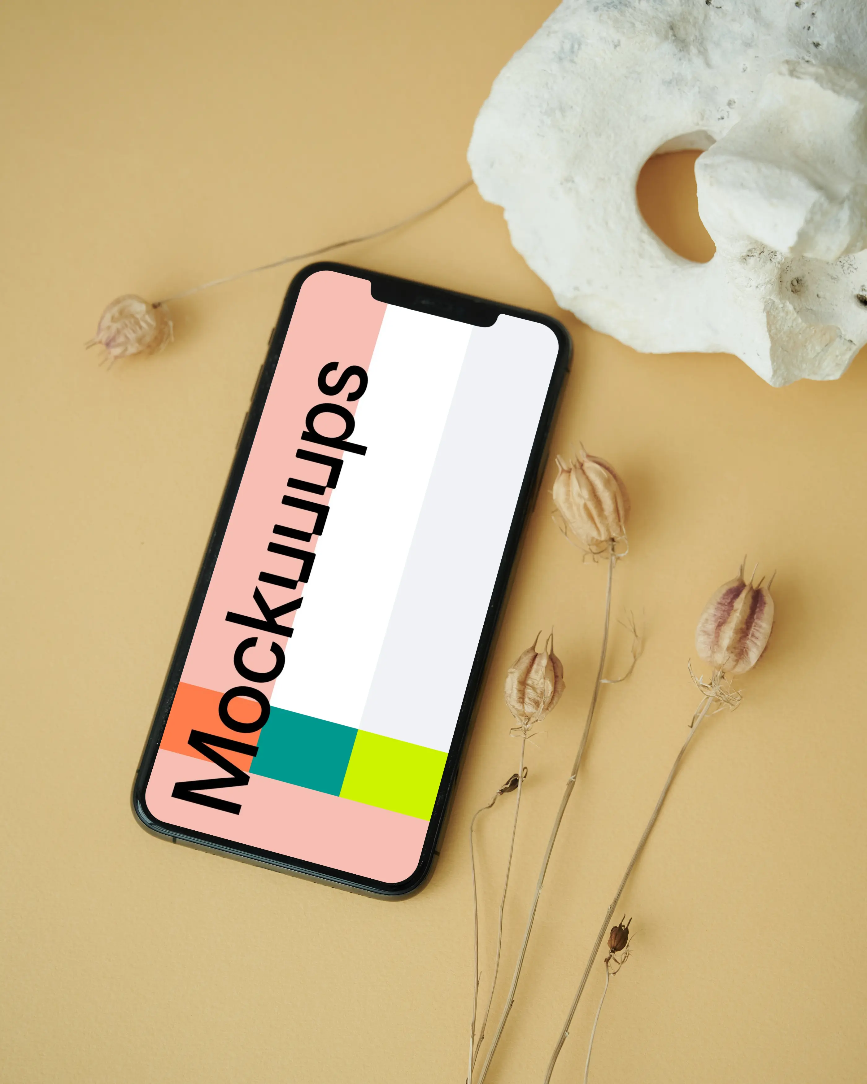 iPhone mockup on a light brown table