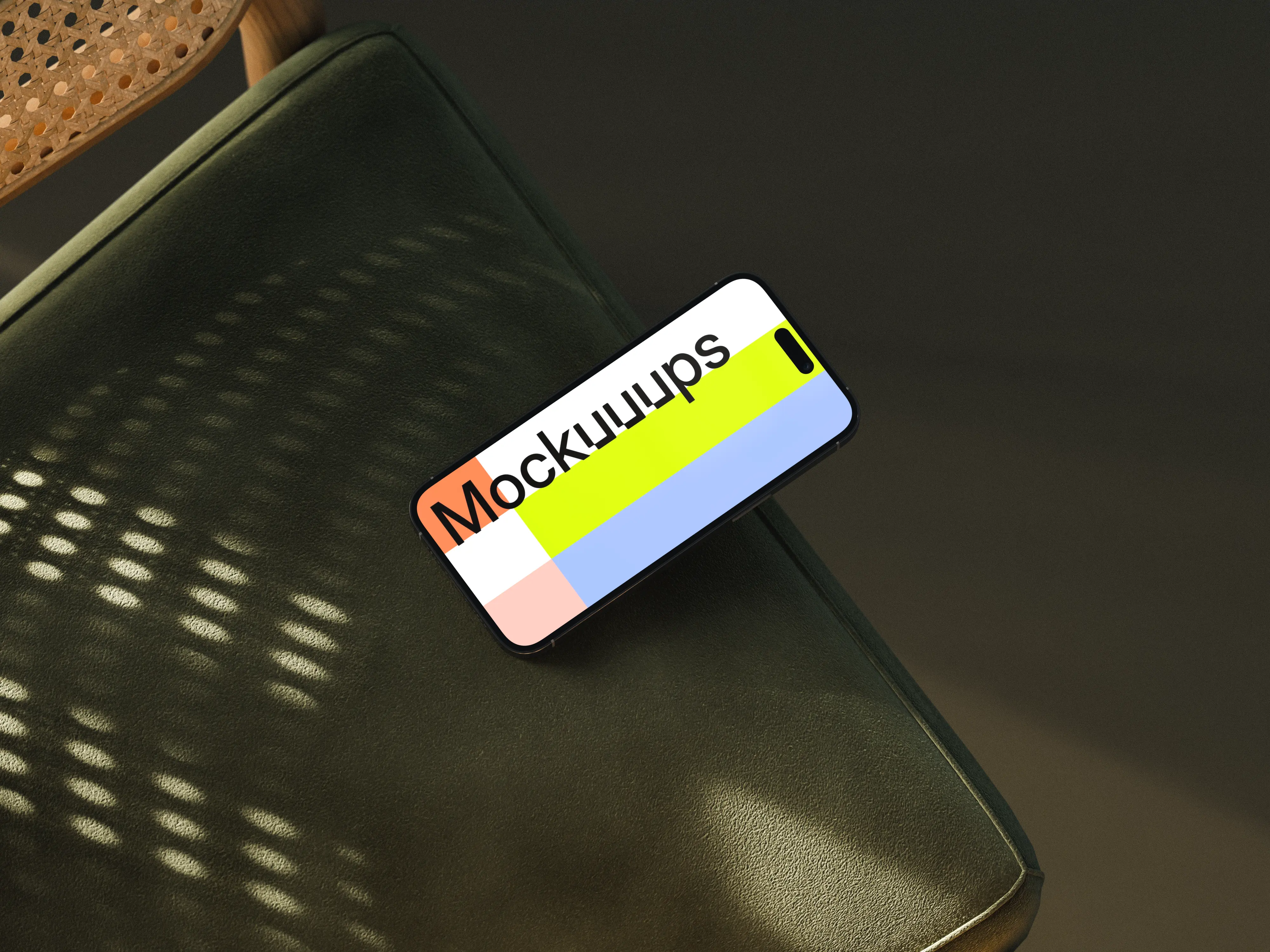 iPhone mockup on a modern leather surface