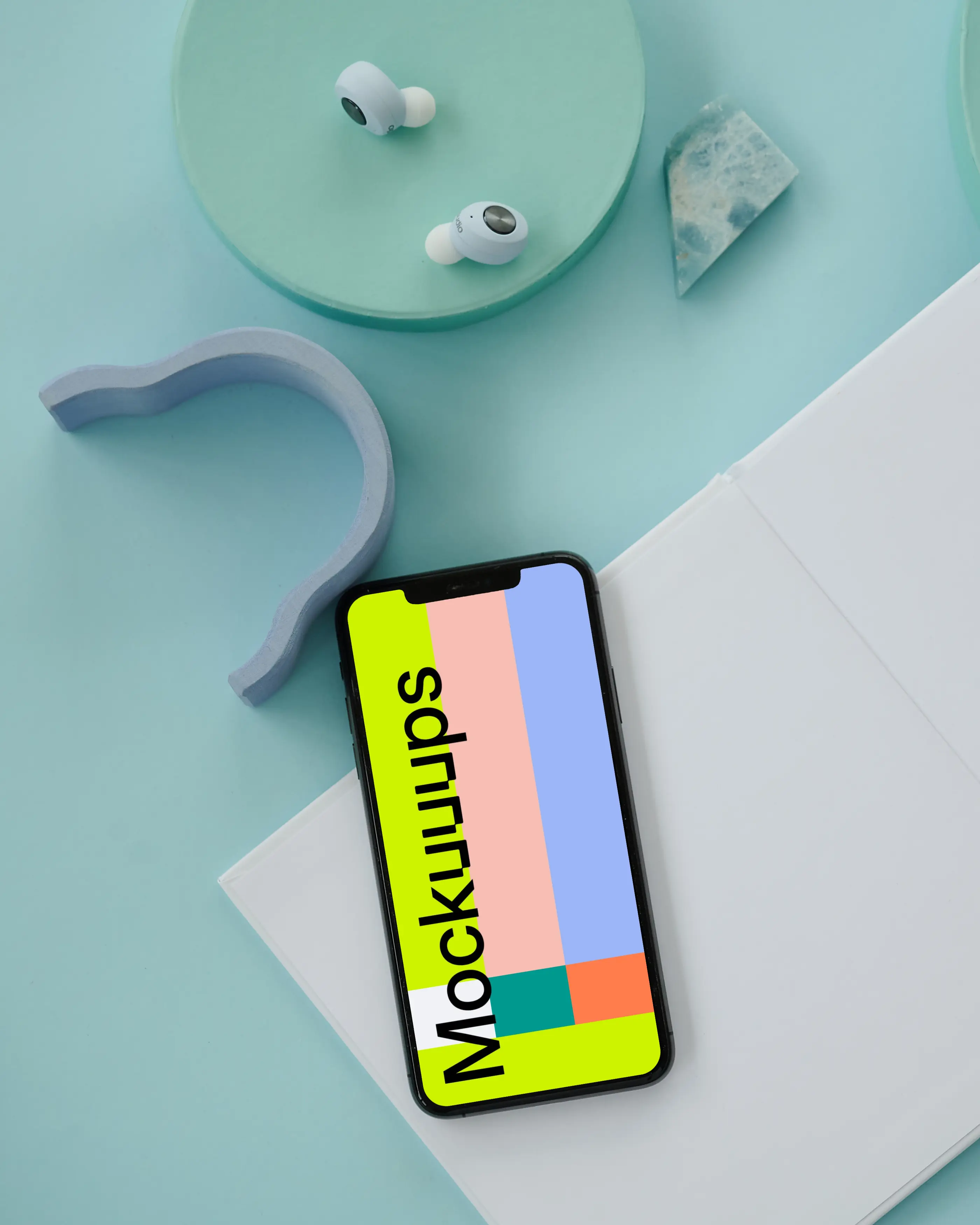 iPhone mockup on a white notepad