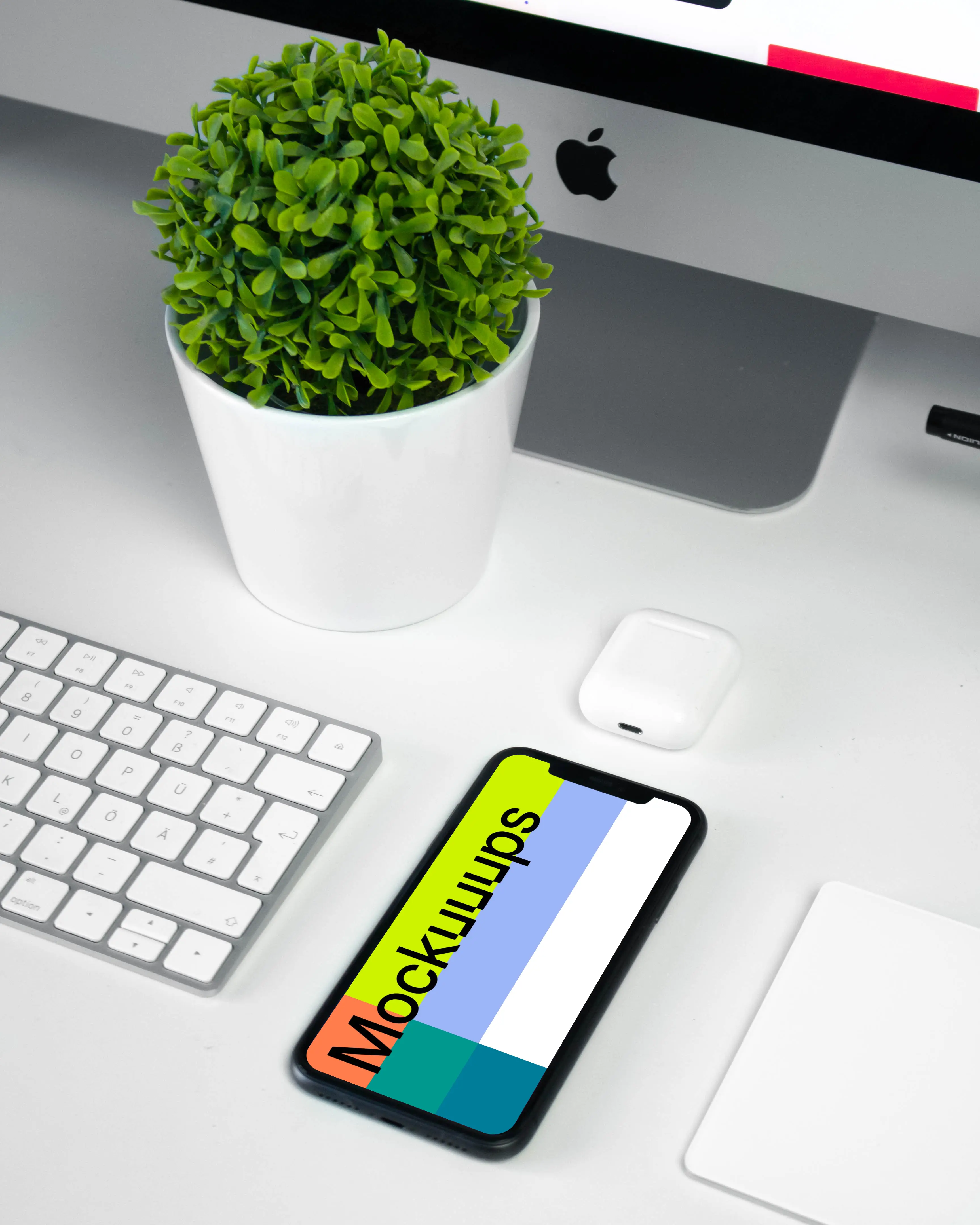 iPhone mockup on a workstation