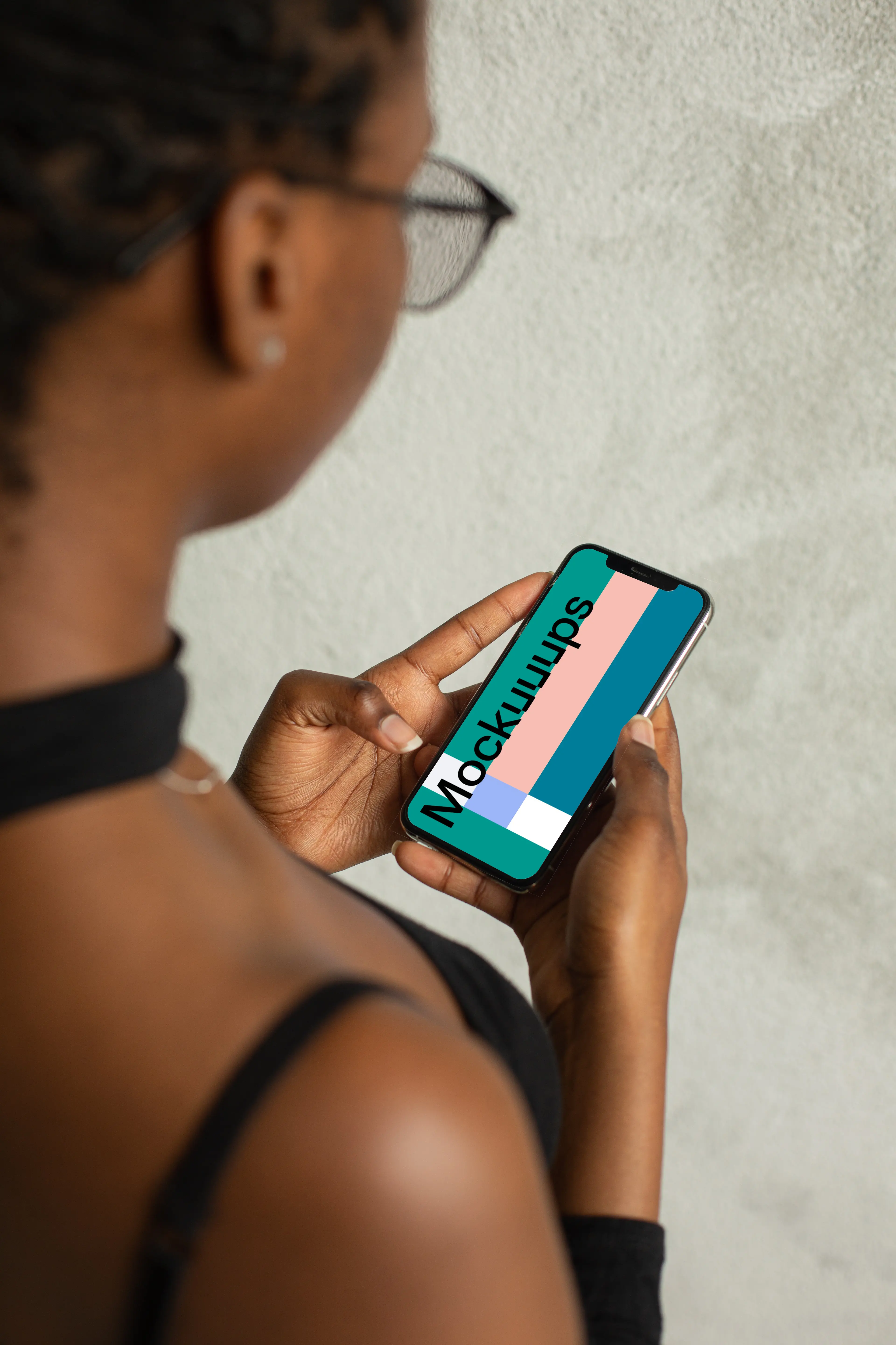 Lady using an iPhone 12 mockup