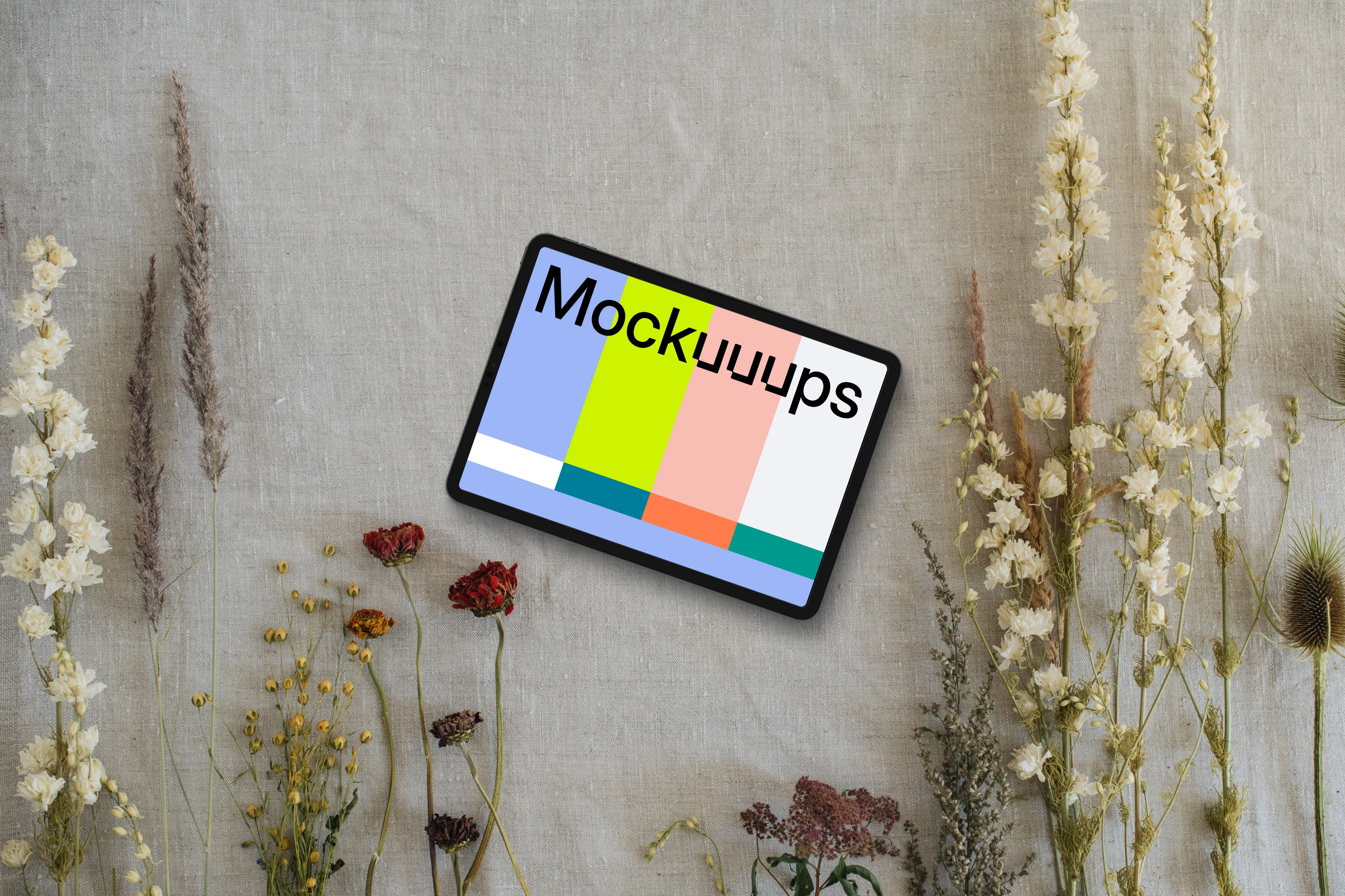 Landscape tablet mockup next to flowers