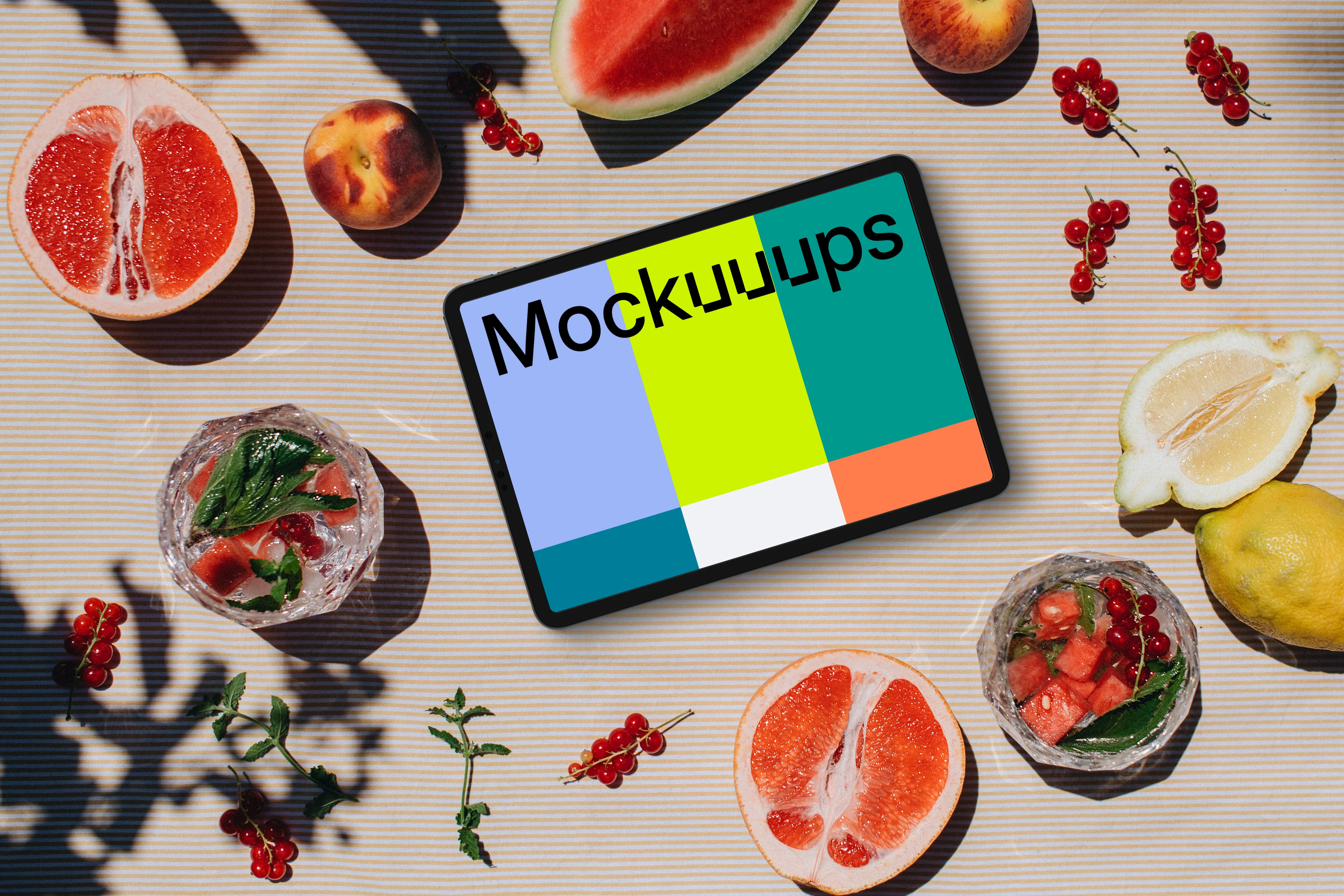 Landscape tablet with a fresh fruit on the table