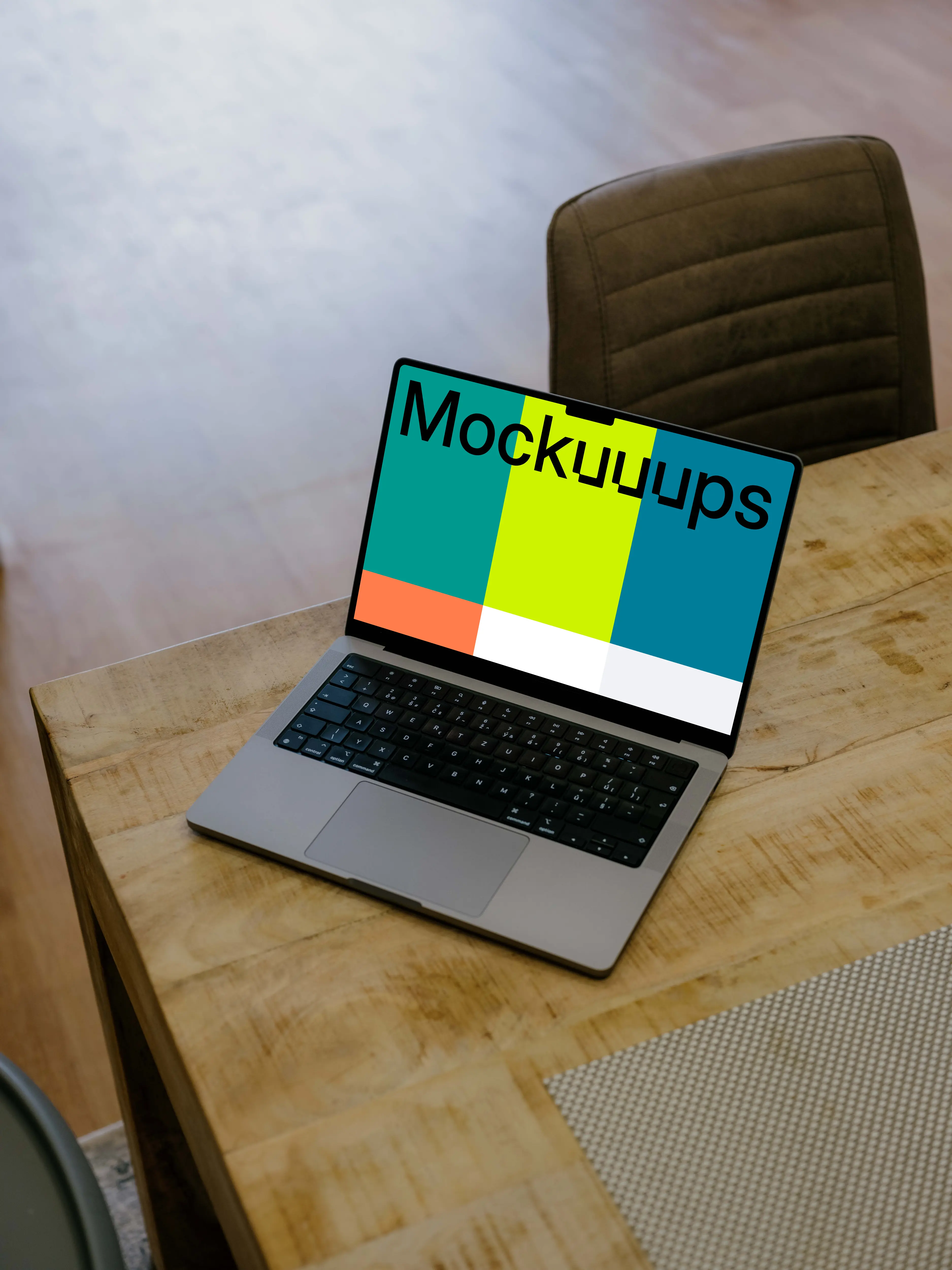 Laptop mockup on the wooden table