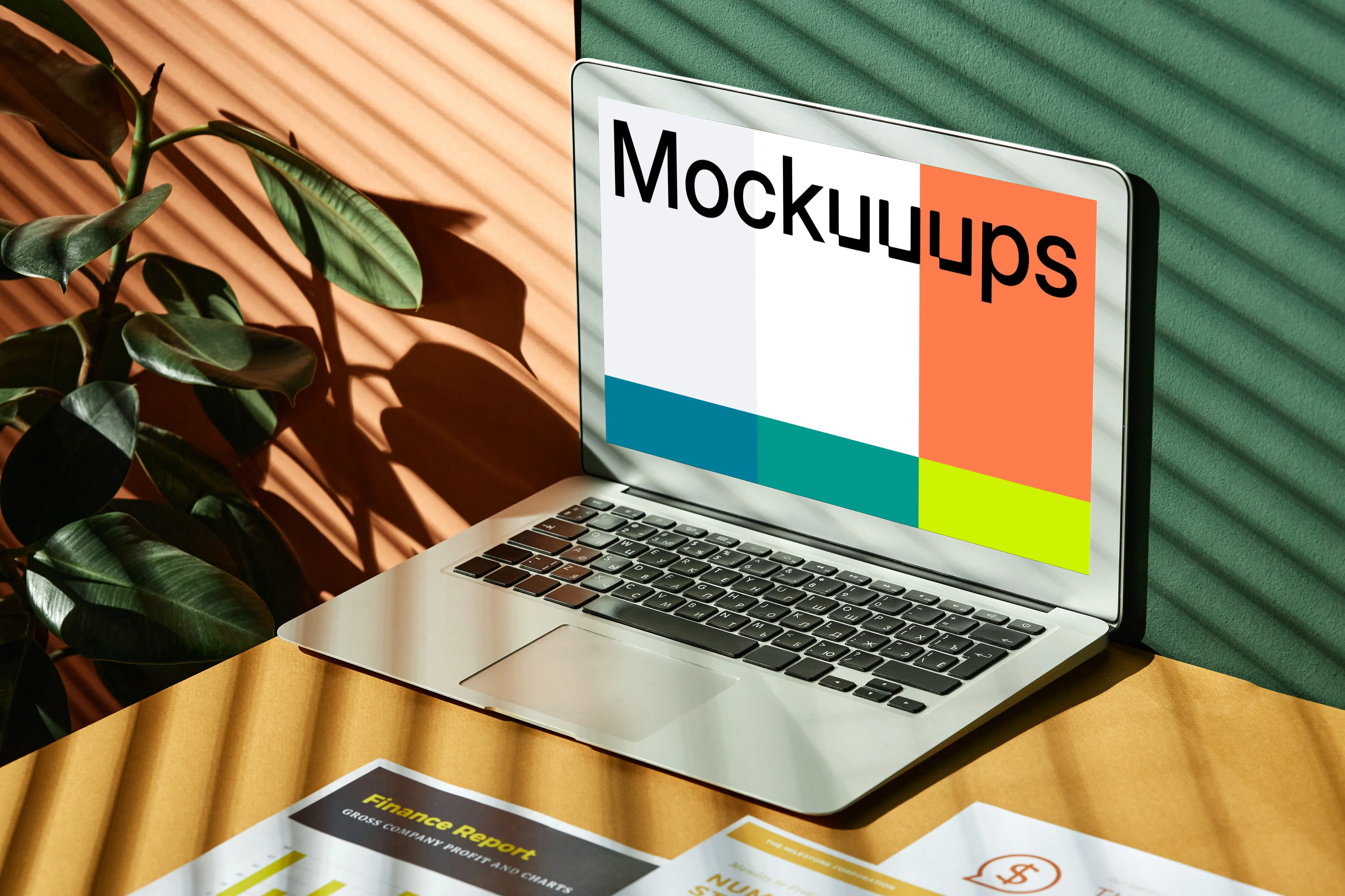 MacBook Air mockup beside a plant