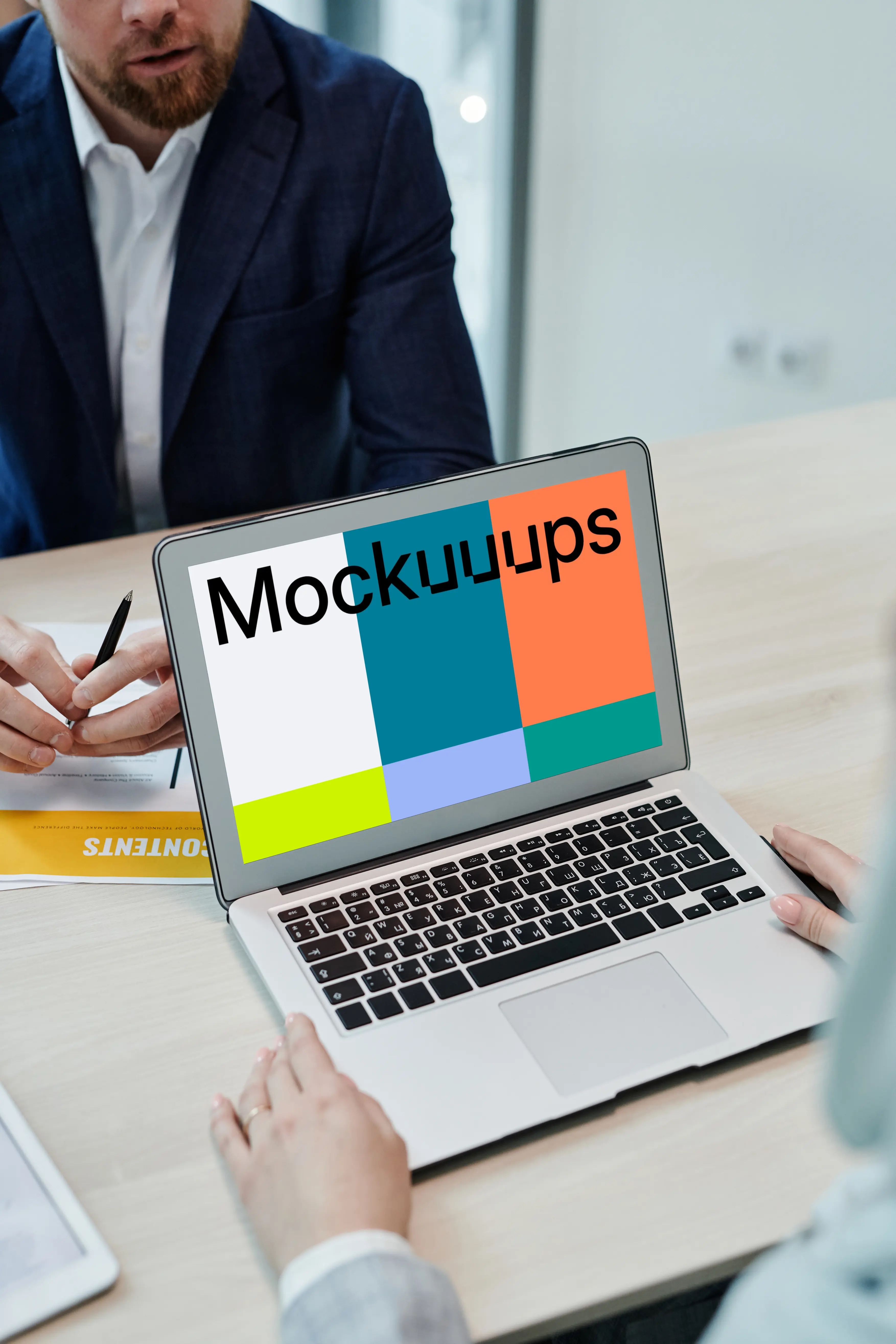 MacBook Air mockup on a wooden table