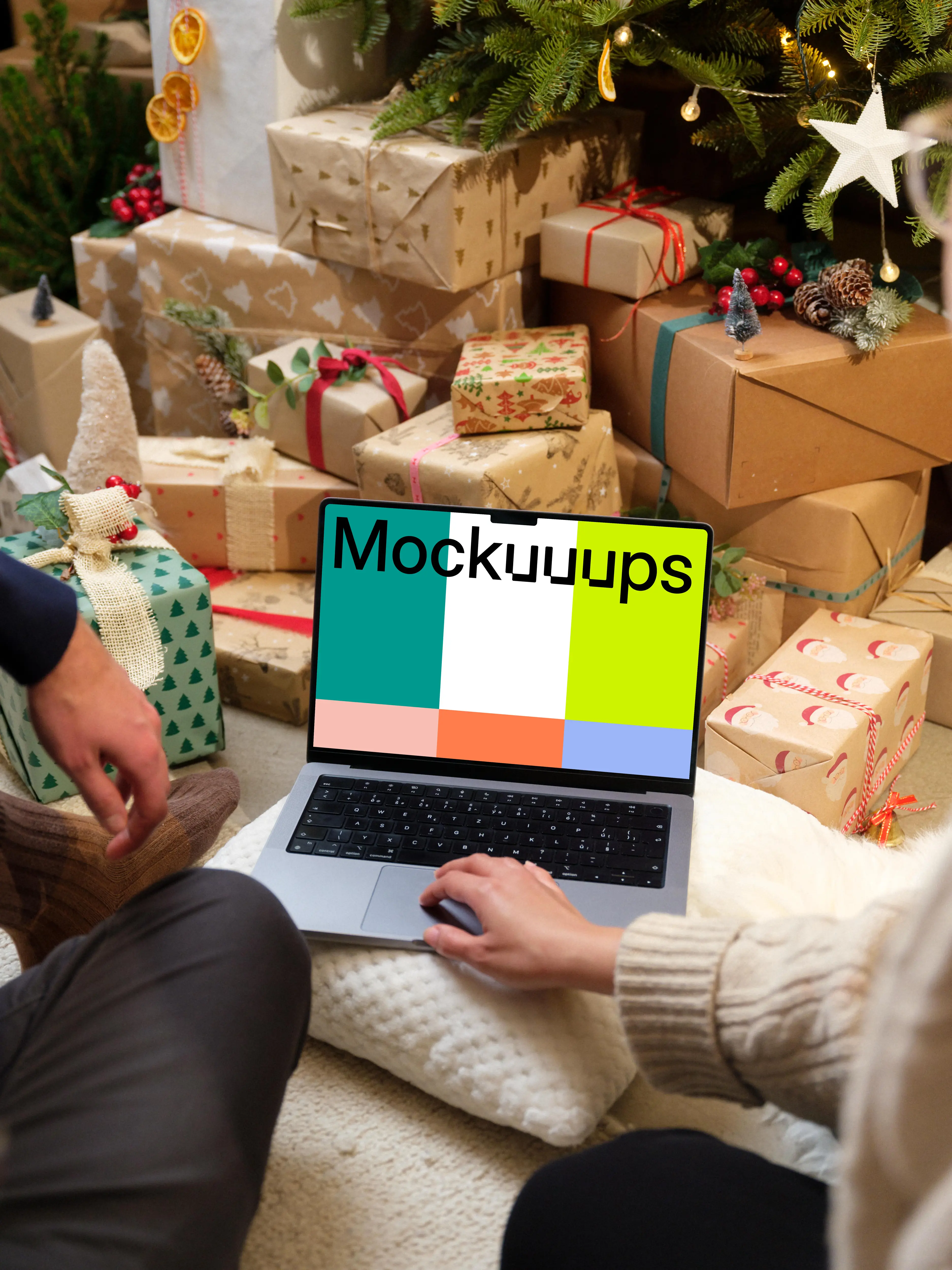 MacBook Pro 14 mockup surrounded by Christmas gifts