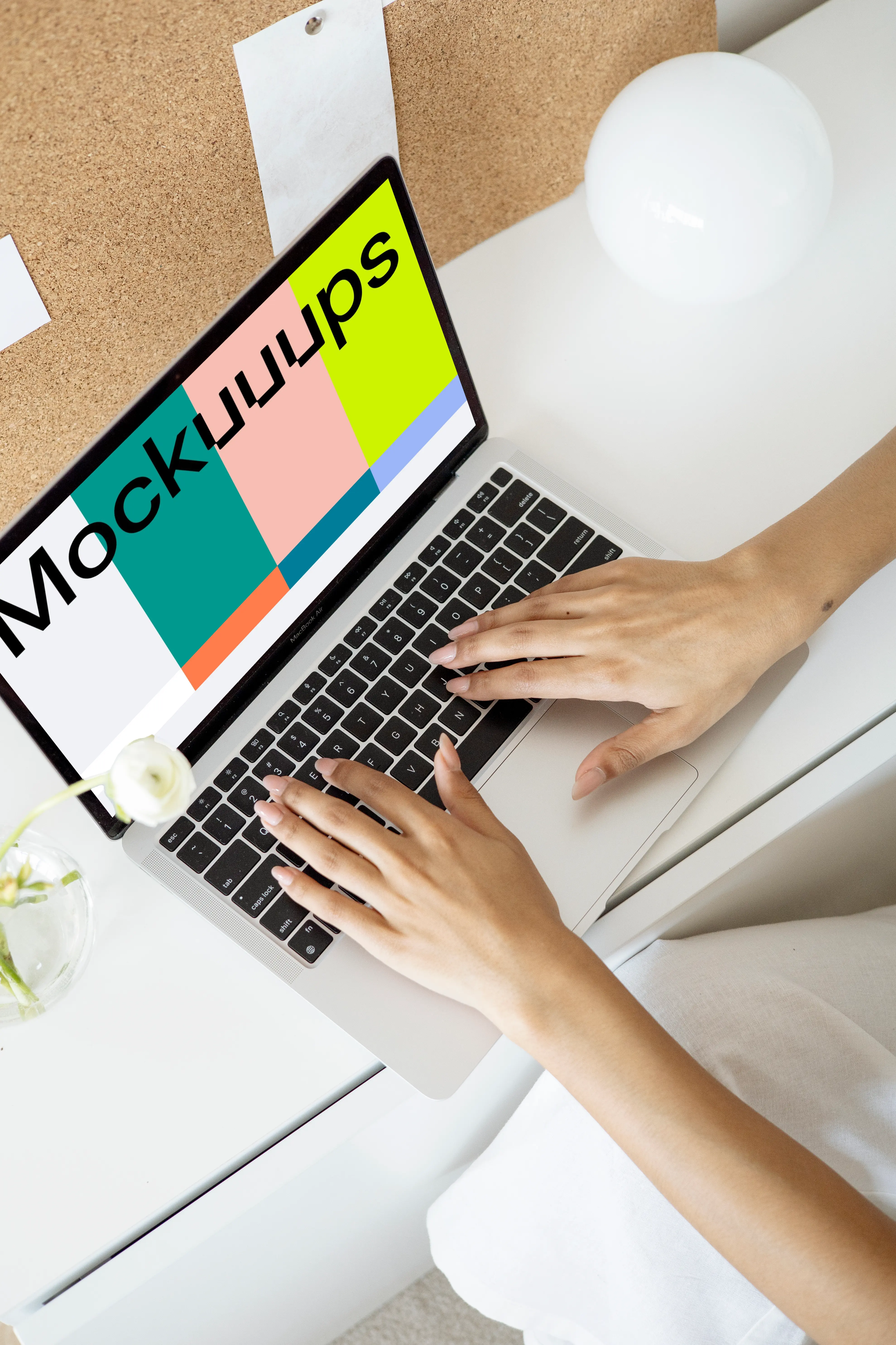 MacBook Pro mockup beside a rose