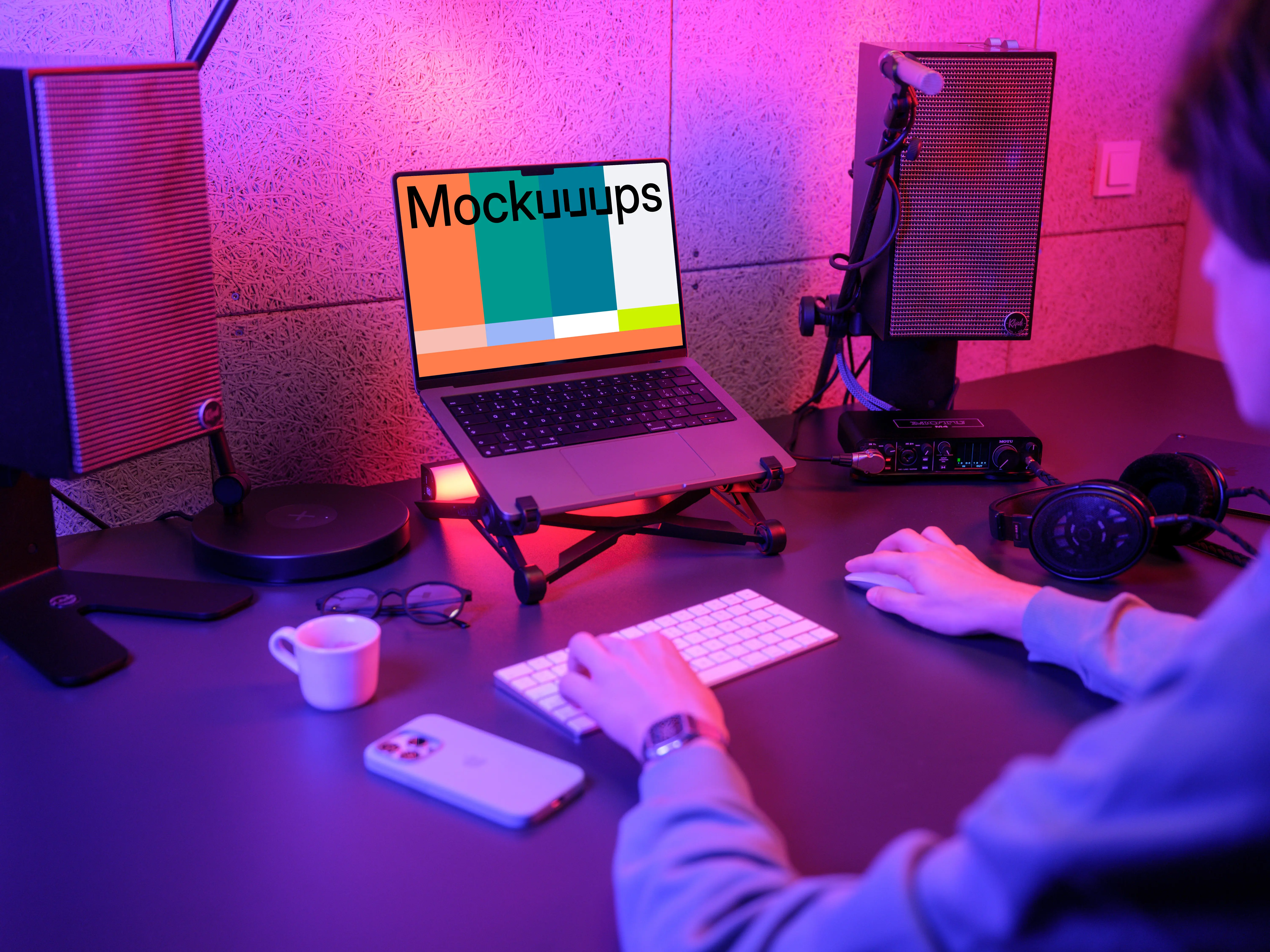 MacBook Pro mockup in a vibrant gaming setup