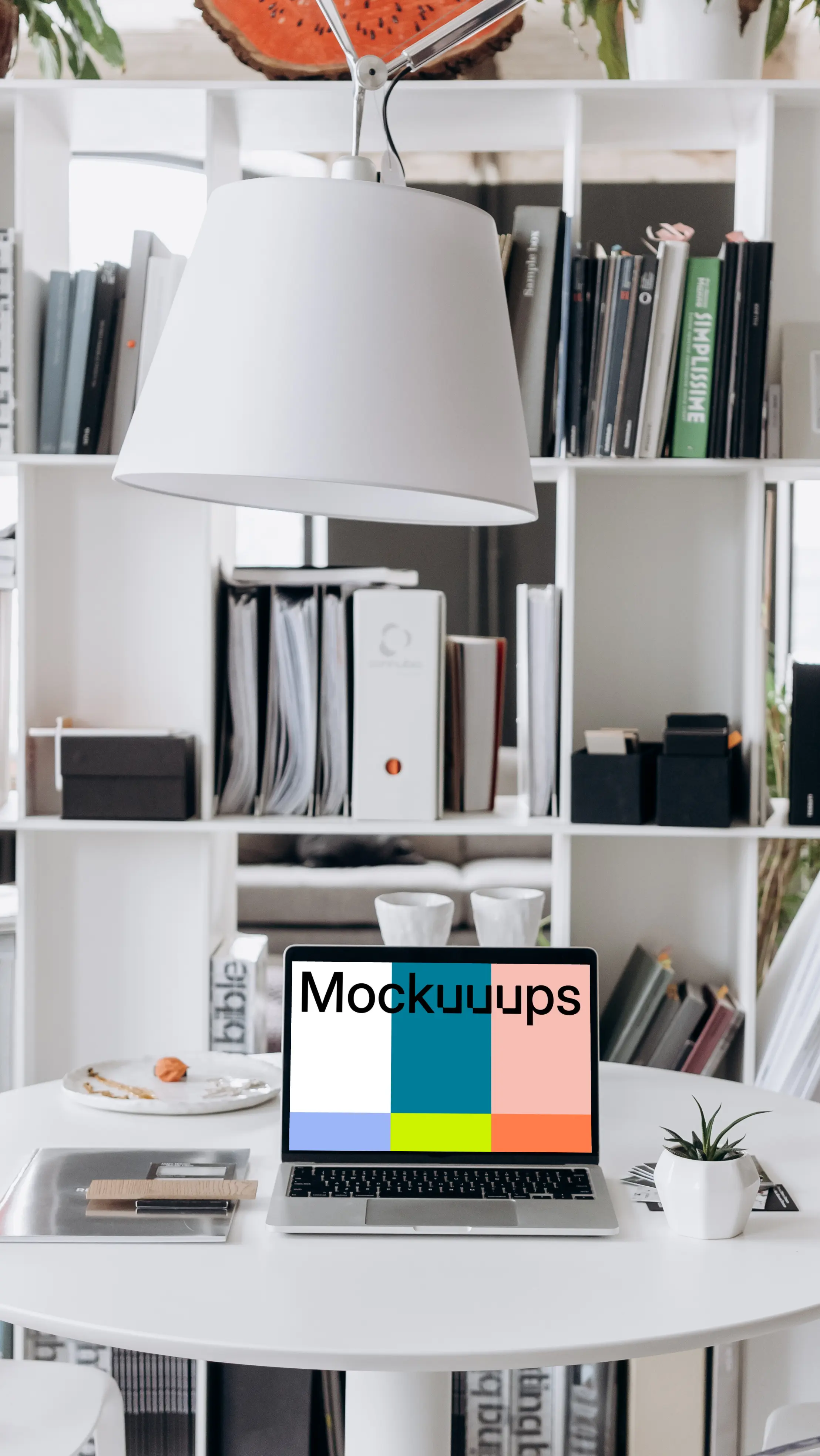 MacBook Pro mockup in front of a shelf